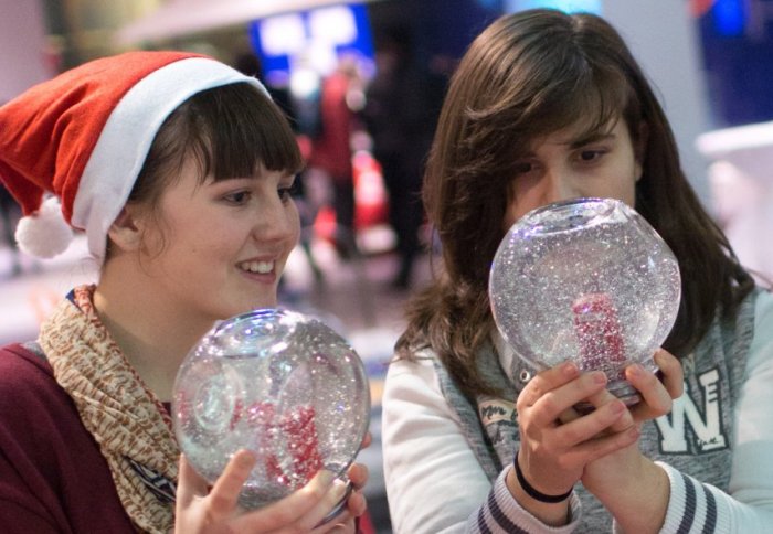 Looking at festive baubles at the Imperial Fringe