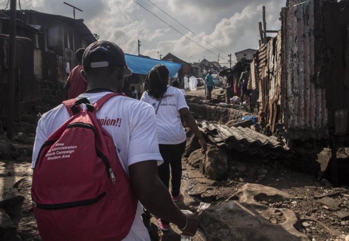 A team from M&eacute;decins Sans Fronti&egrave;res distribute malaria drugs in Sierra Leone