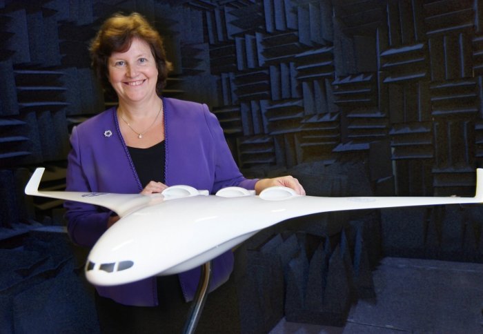 Professor Dame Ann Dowling with model of next-generation aircraft