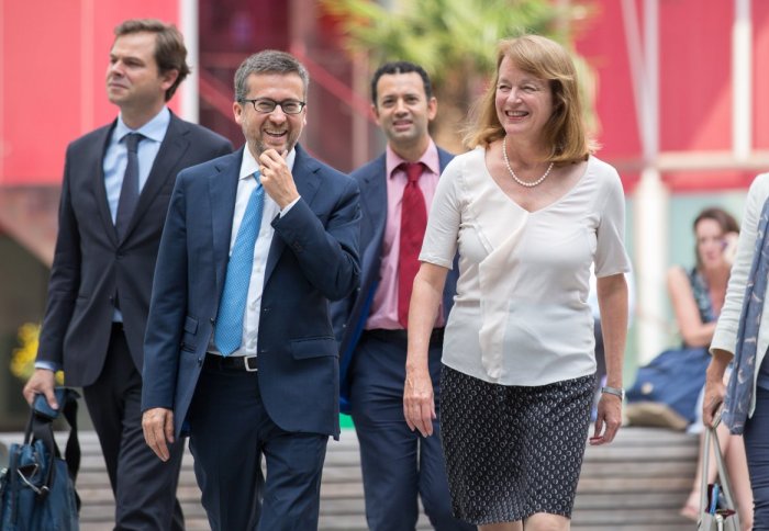 Carlos Moedas, EU Commissioner for Research, Science and Innovation, walking across Dalby Court with Professor Alice Gast