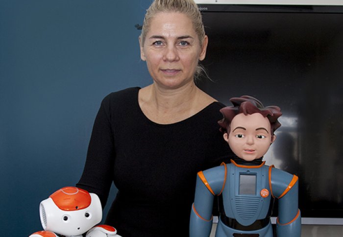 This happy robot helps kids with autism