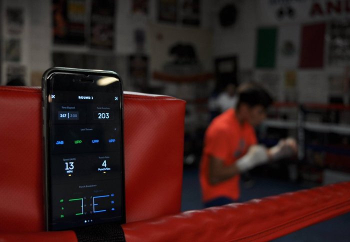 Corner by Athletec app with a boxer training in the background