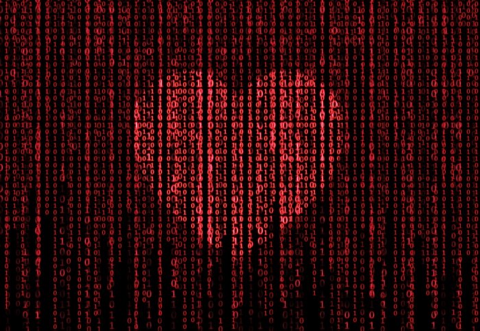 Graphic image of heart shape on lines of code