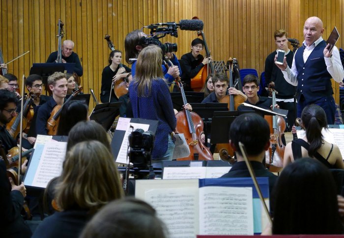 The orchestra during the recording of their appearance on the BBC's The One Show