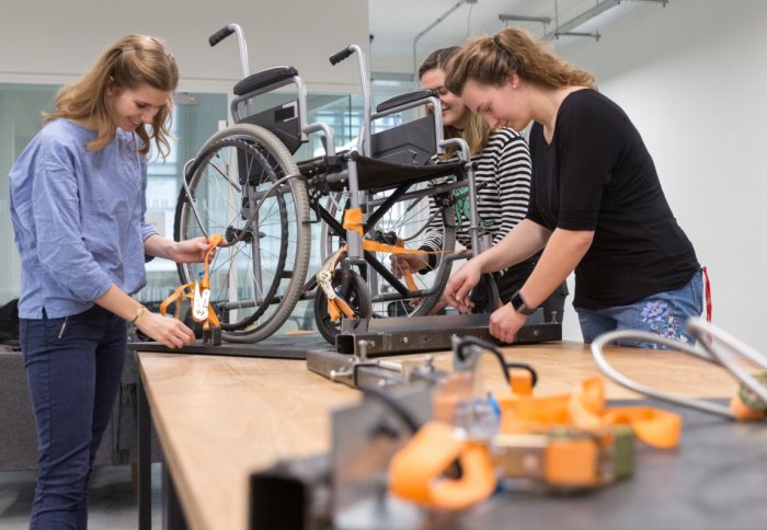 The team assembling the Wheelchair Fencing frame