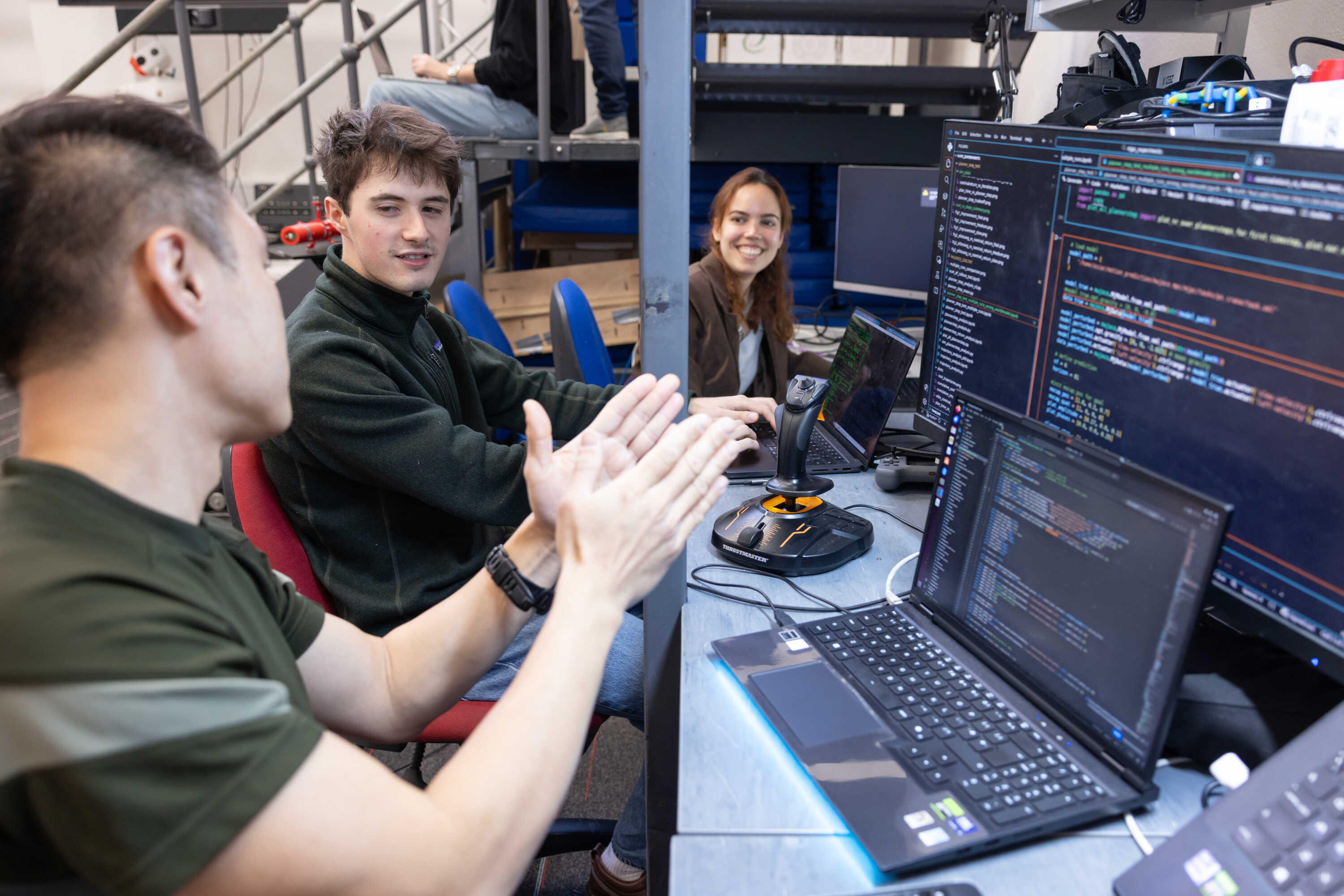 Three students studying in the Department of Computing at Imperial.