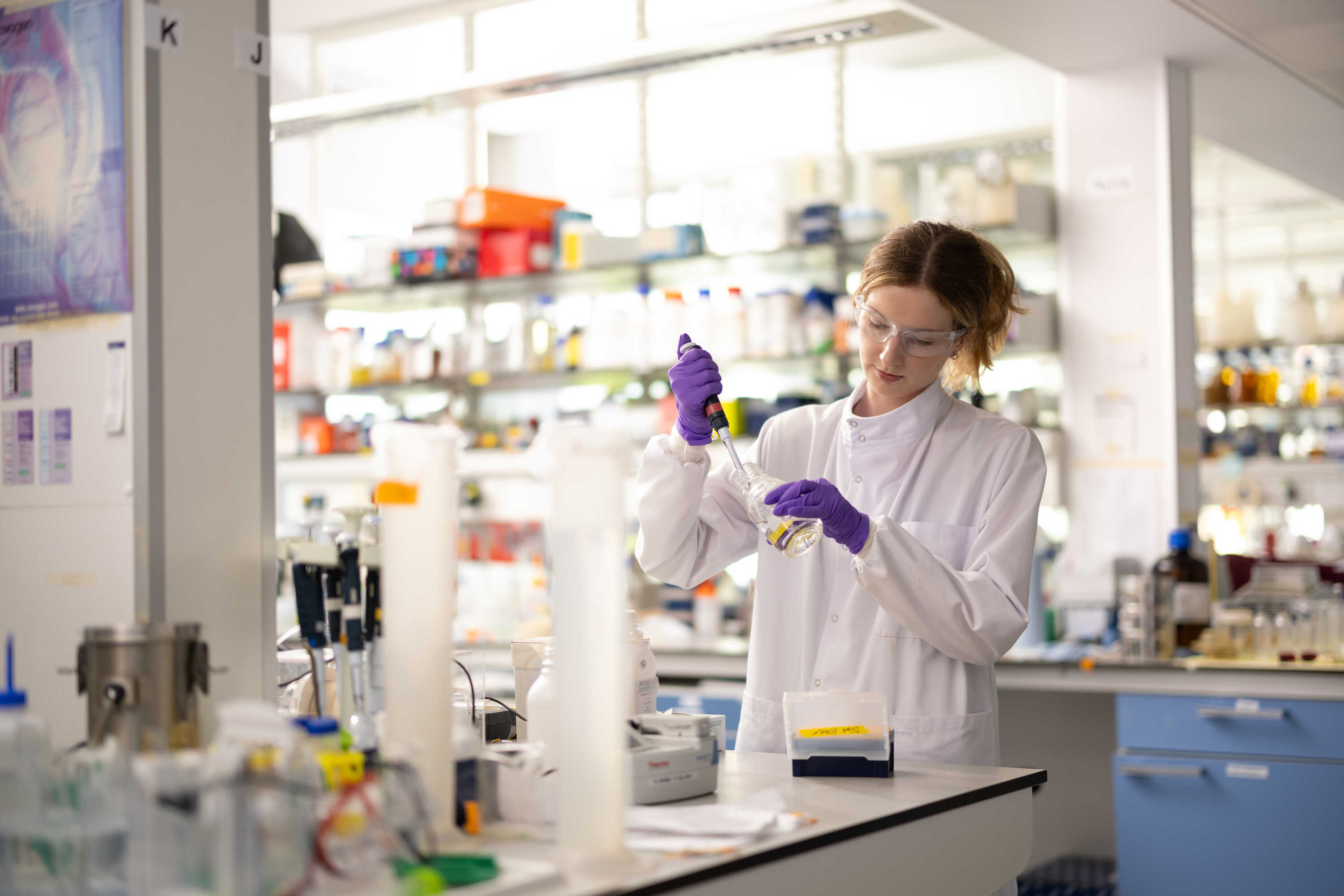 A researchers working in a medicine lab