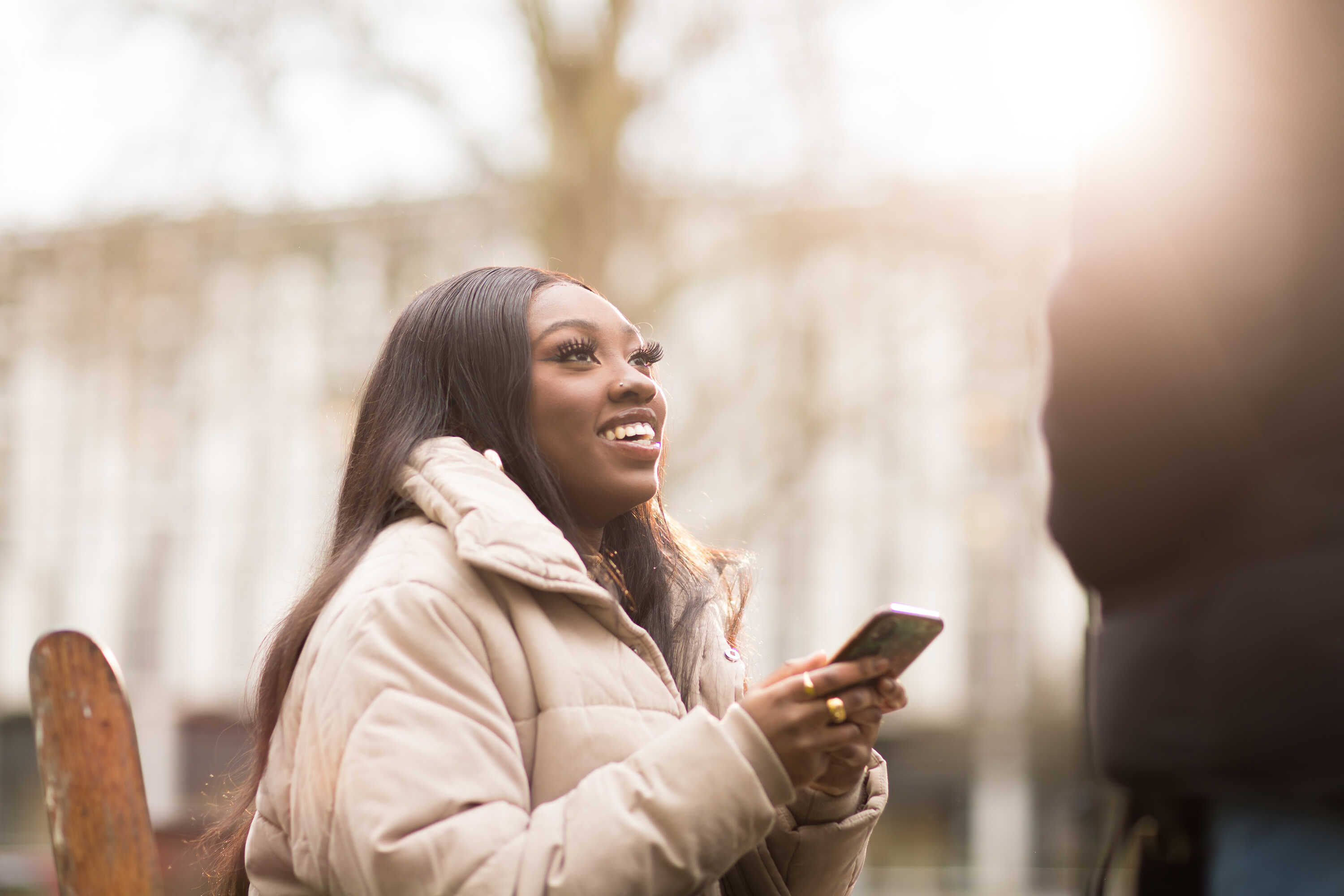 female student using mobile phone
