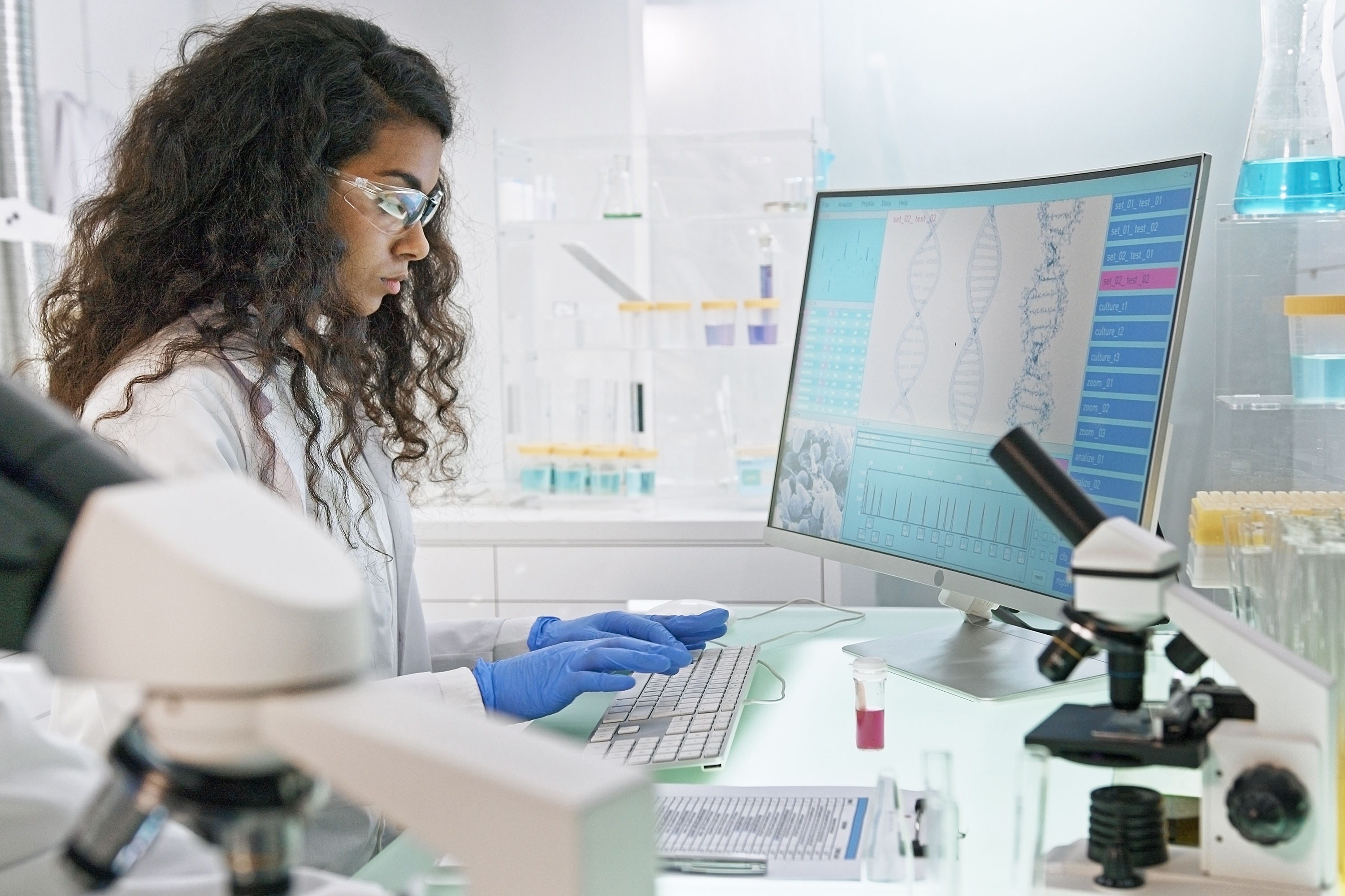 A scientist working at a computer