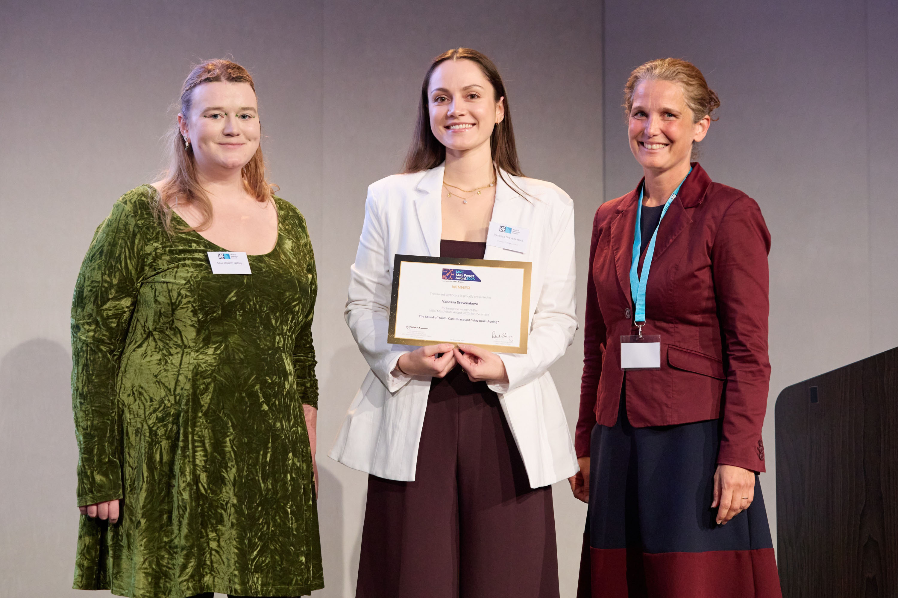 Vanessa winning the writing category of the MRC Max Perutz Award 2025. From left to right: Elspeth Oakley (Judging Panel Public Member), Vanessa, and Dr Joanna Robinson (Chair of the Judging Panel).