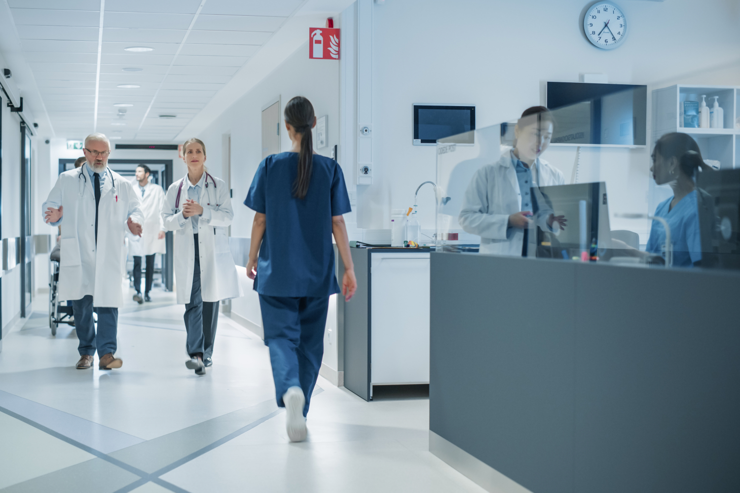 Doctors and nurses in a hospital corridor