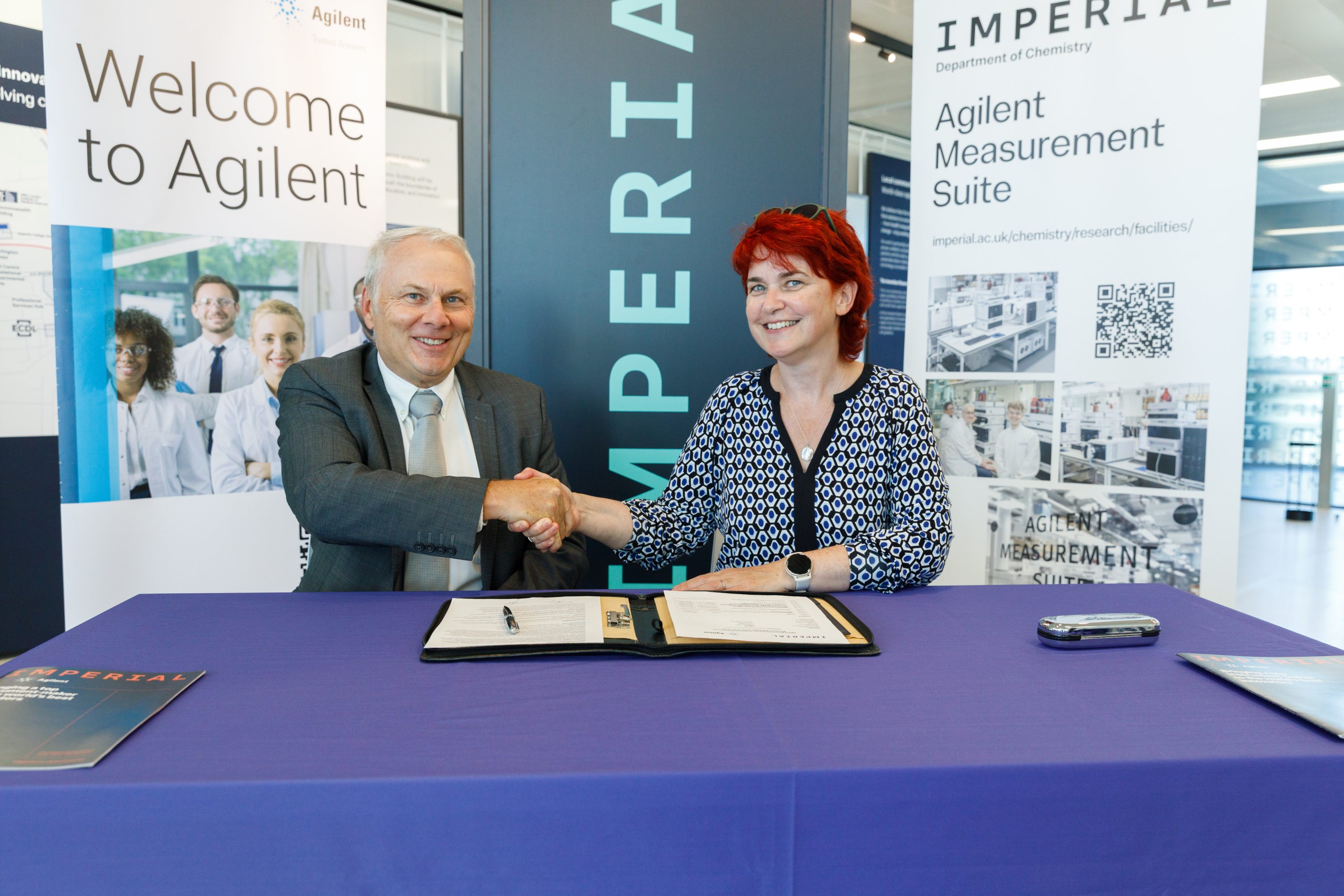 Frédéric Laget of Agilent and Professor Mary Ryan shake hands after signing the AMS renewal agreement