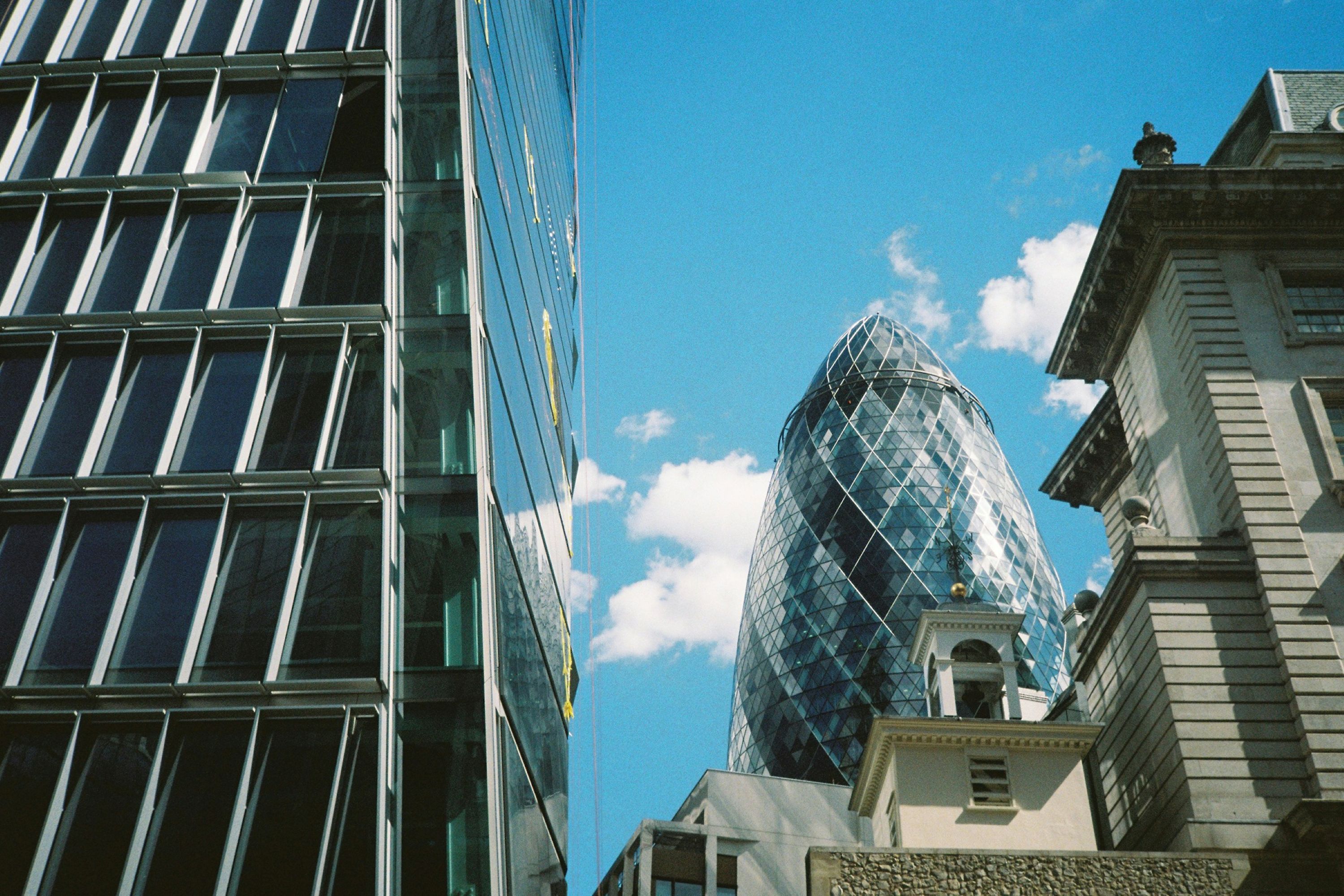 A shot looking up at London's buildings in the city district