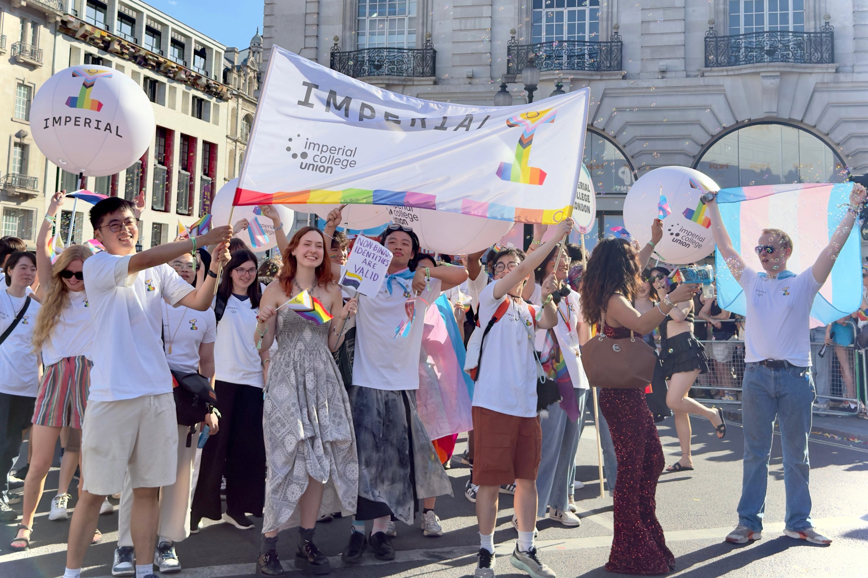Staff and students holding Imperial banners marching in Pride in London 2026