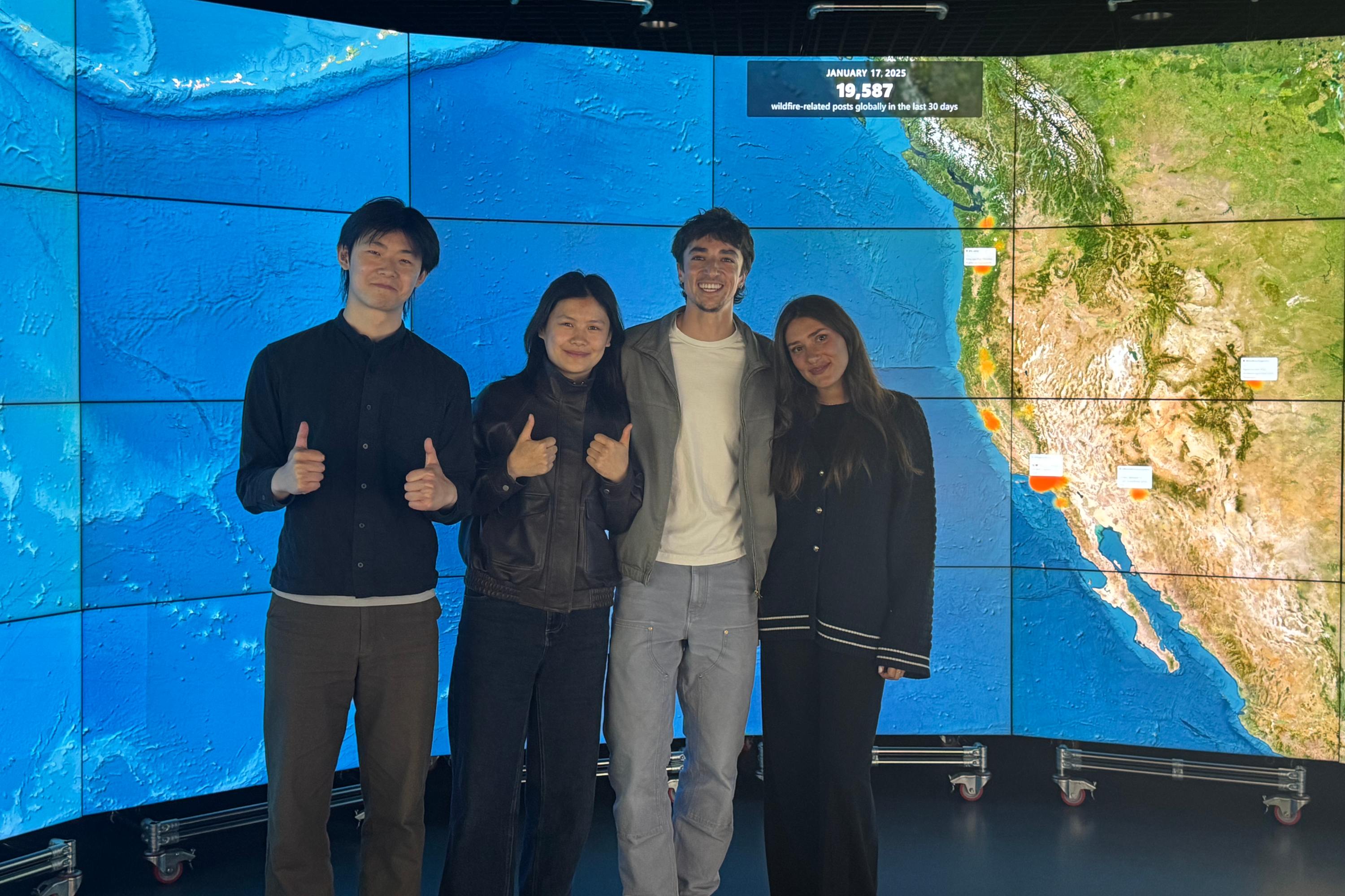 Data for humanity interns standing in front of the data observatory
