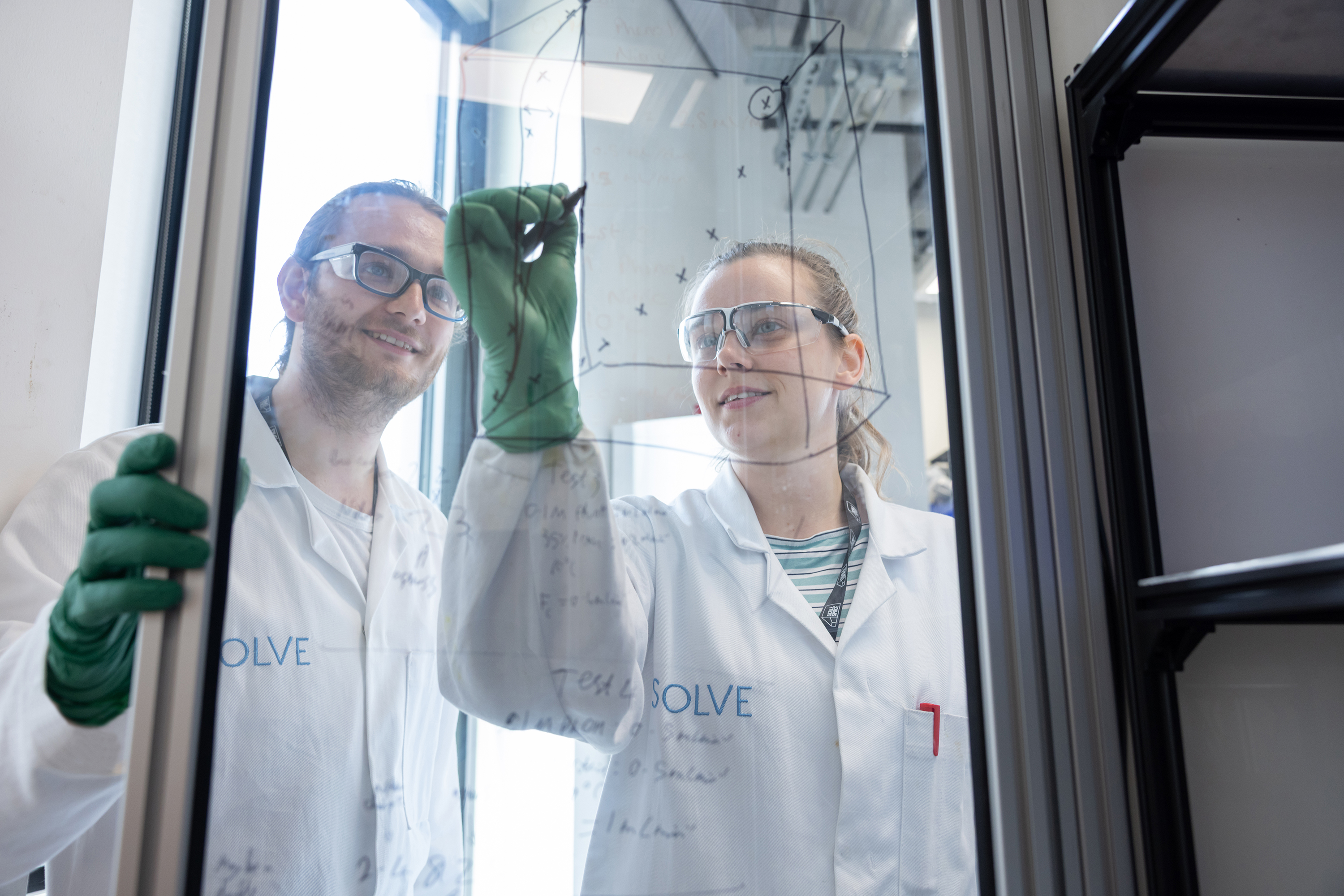 Two people in white coats