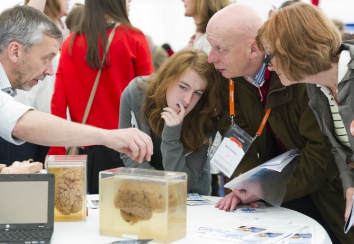 Alumnus and family explore the Festival Research Zone