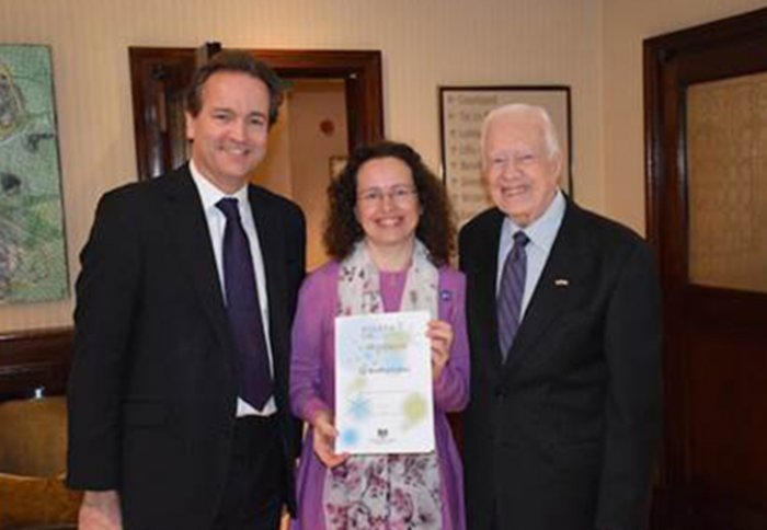 International Development Minister Nick Hurd, Dr Beatriz Calvo and former US President Jimmy Carter