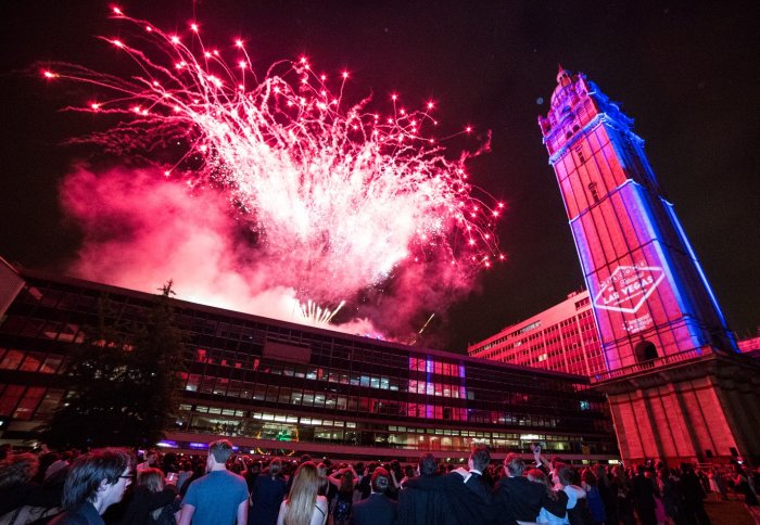 big red firework beside Queen's Tower