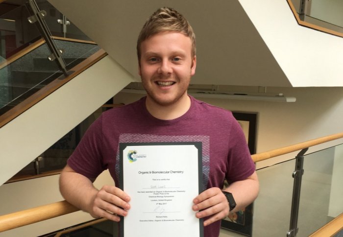 Scott with his certificate