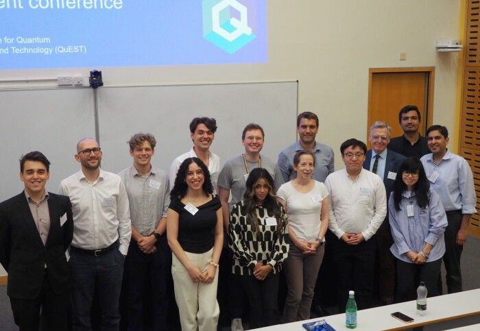 Attendees pose for a photograph at the conference
