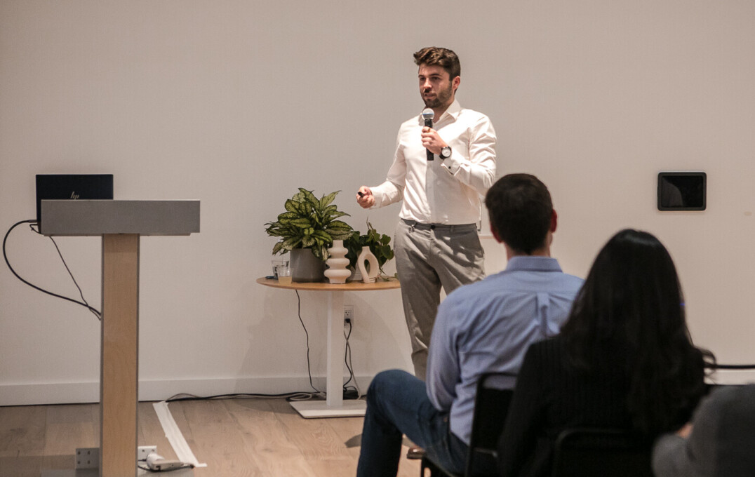 A man speaks into a microphone