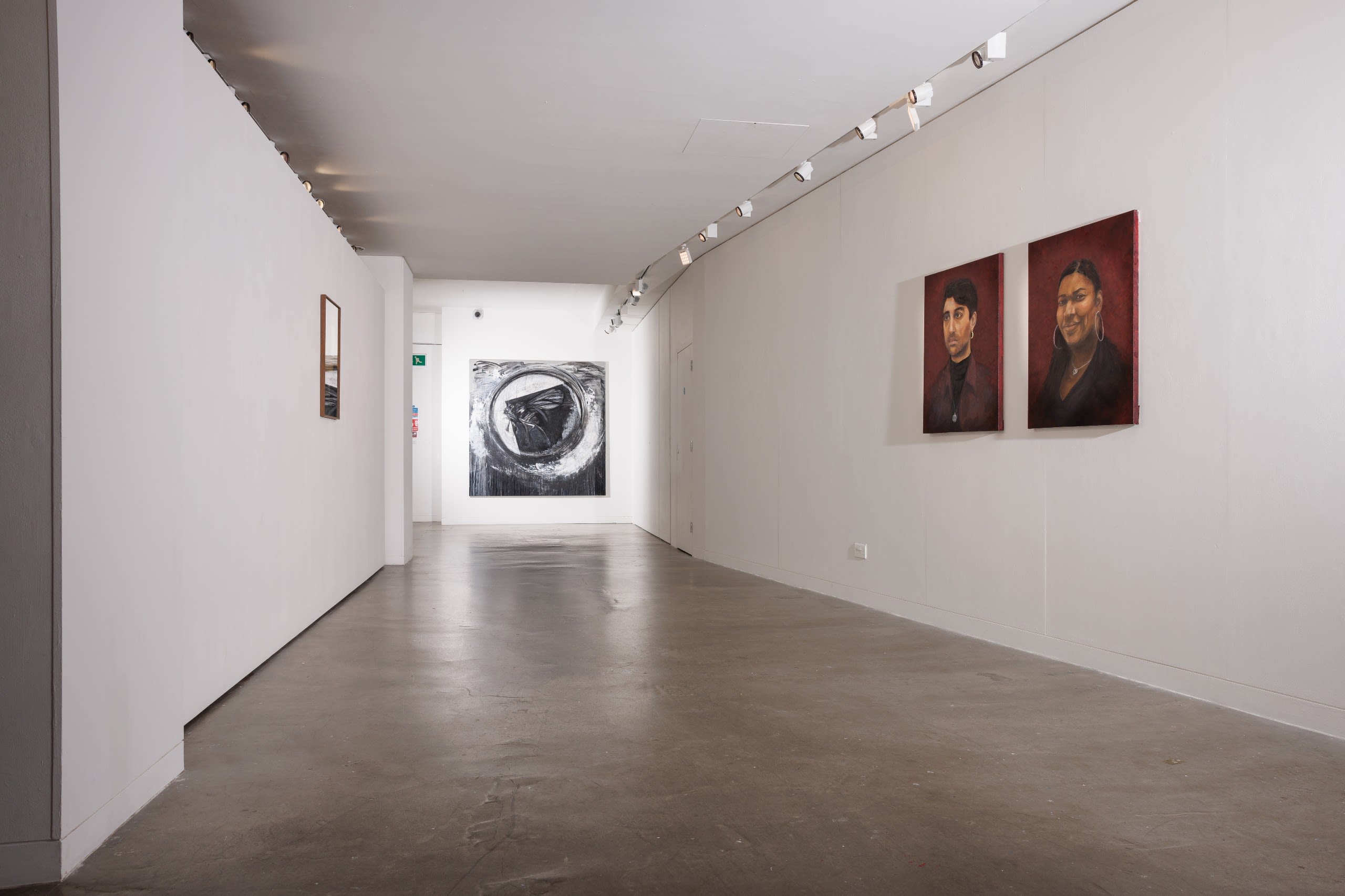 This image shows the first exhibition of the EDI Portrait Prize works at Imperial's Blyth Gallery in January 2022