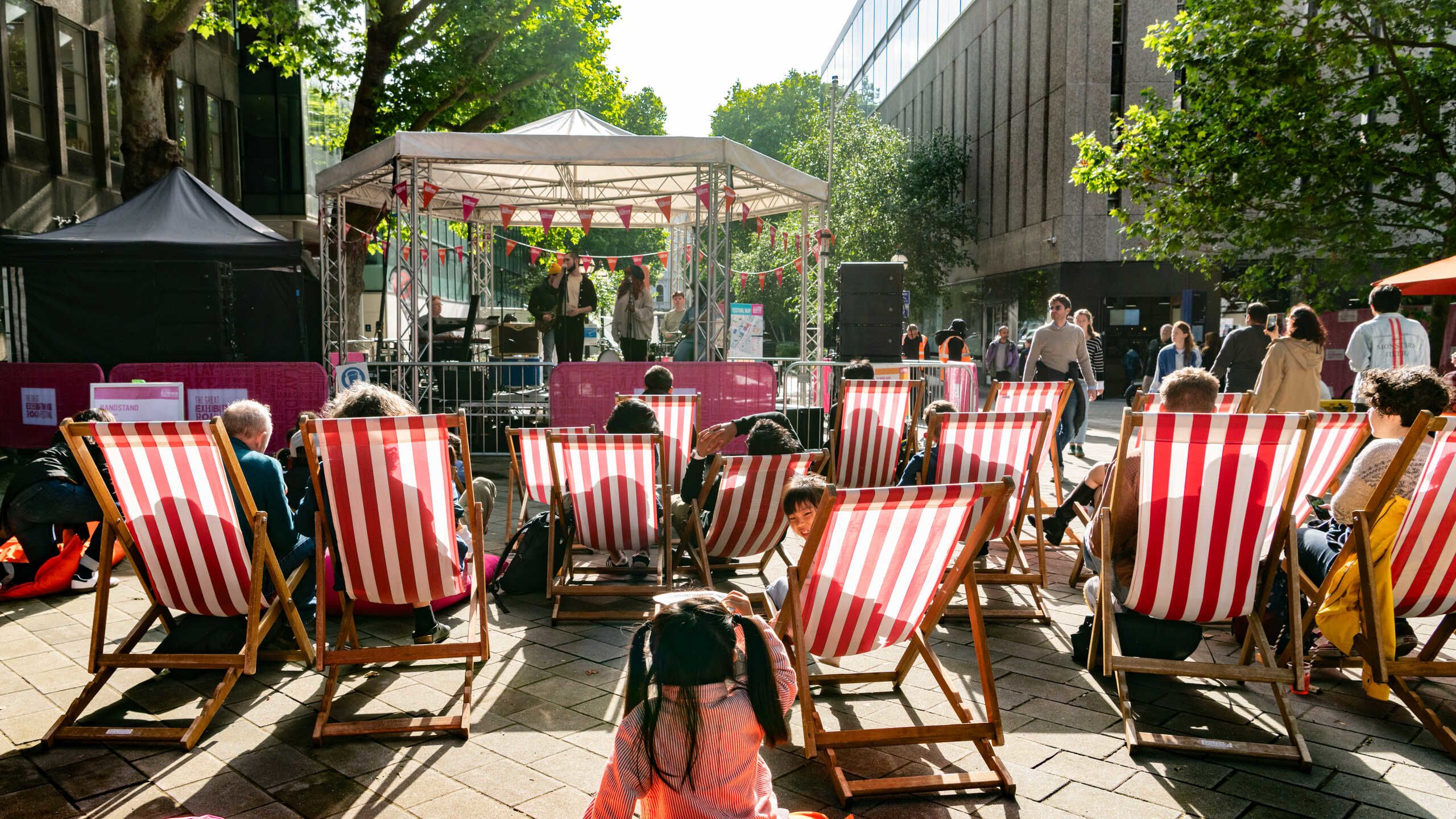 People sitting in deckchairs at the Great Exhibition Road Festival