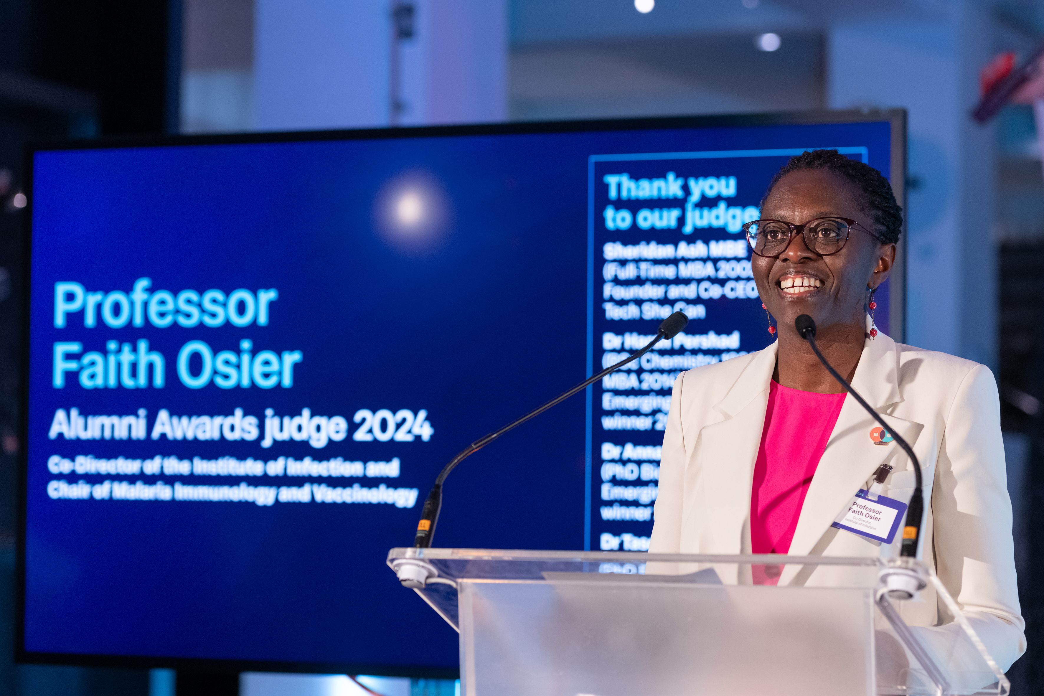 Professor Faith Osier presents awards at the Annual Alumni Celebration