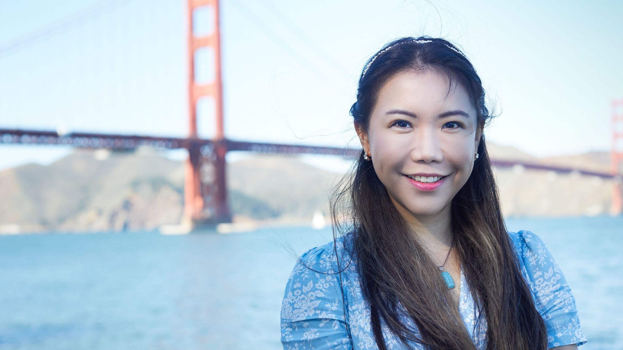 Val Yap in front of the Golden Gate Bridge, California