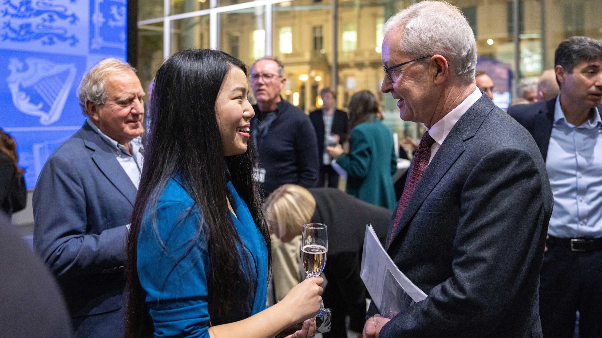 Professor Hugh Brady speaking are Hayley Wong president of the Student Union, and John Allen, Chair of Council at the Inaugural President's Address