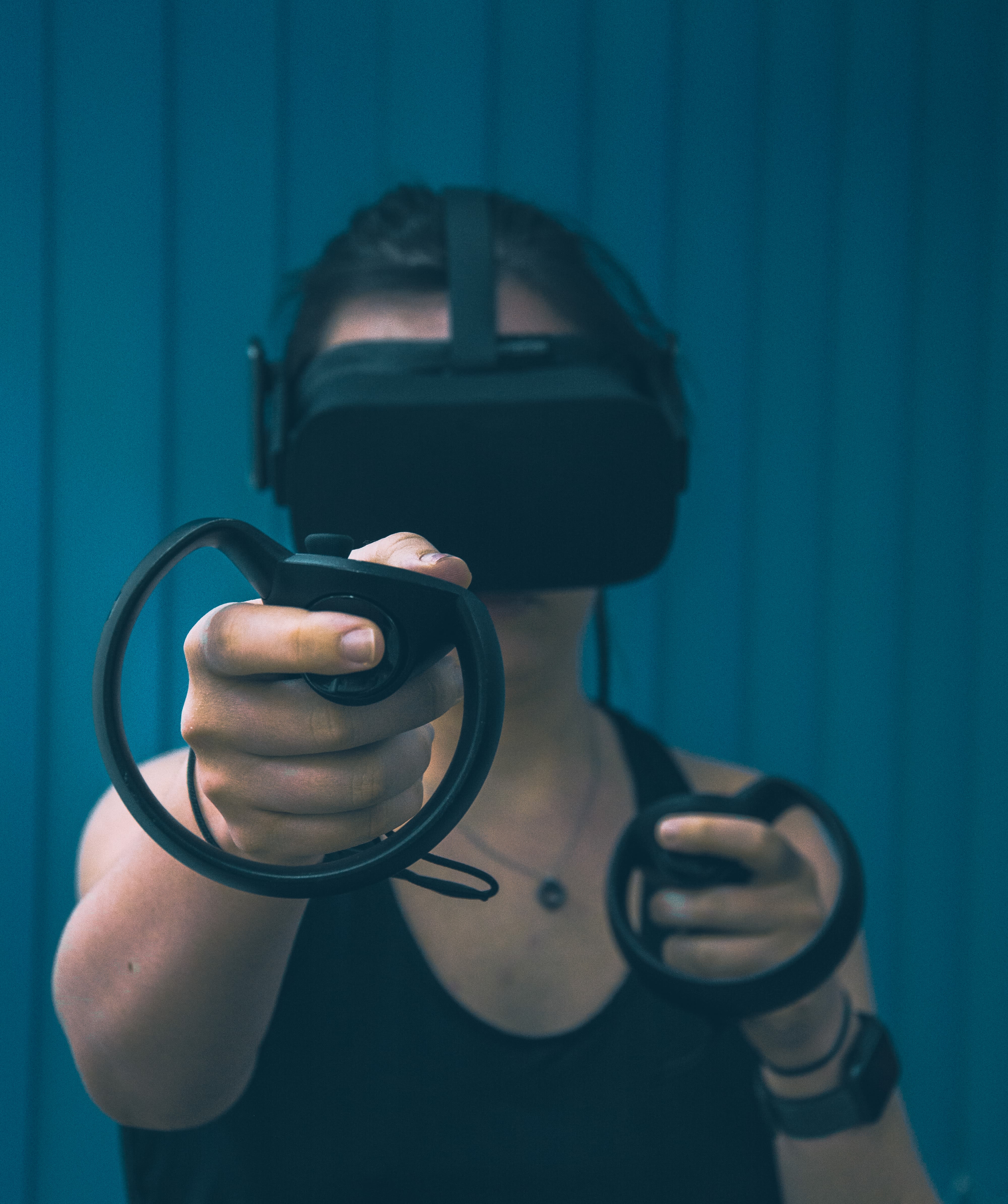 person wearing a black VR set.