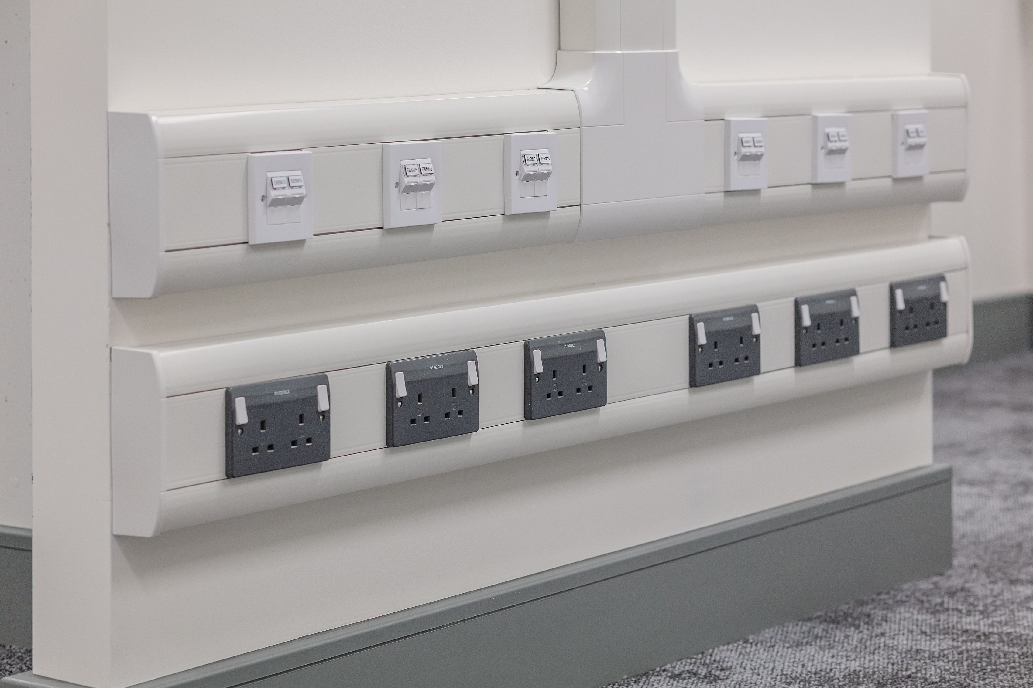 A close up of powerbank sockets and switches