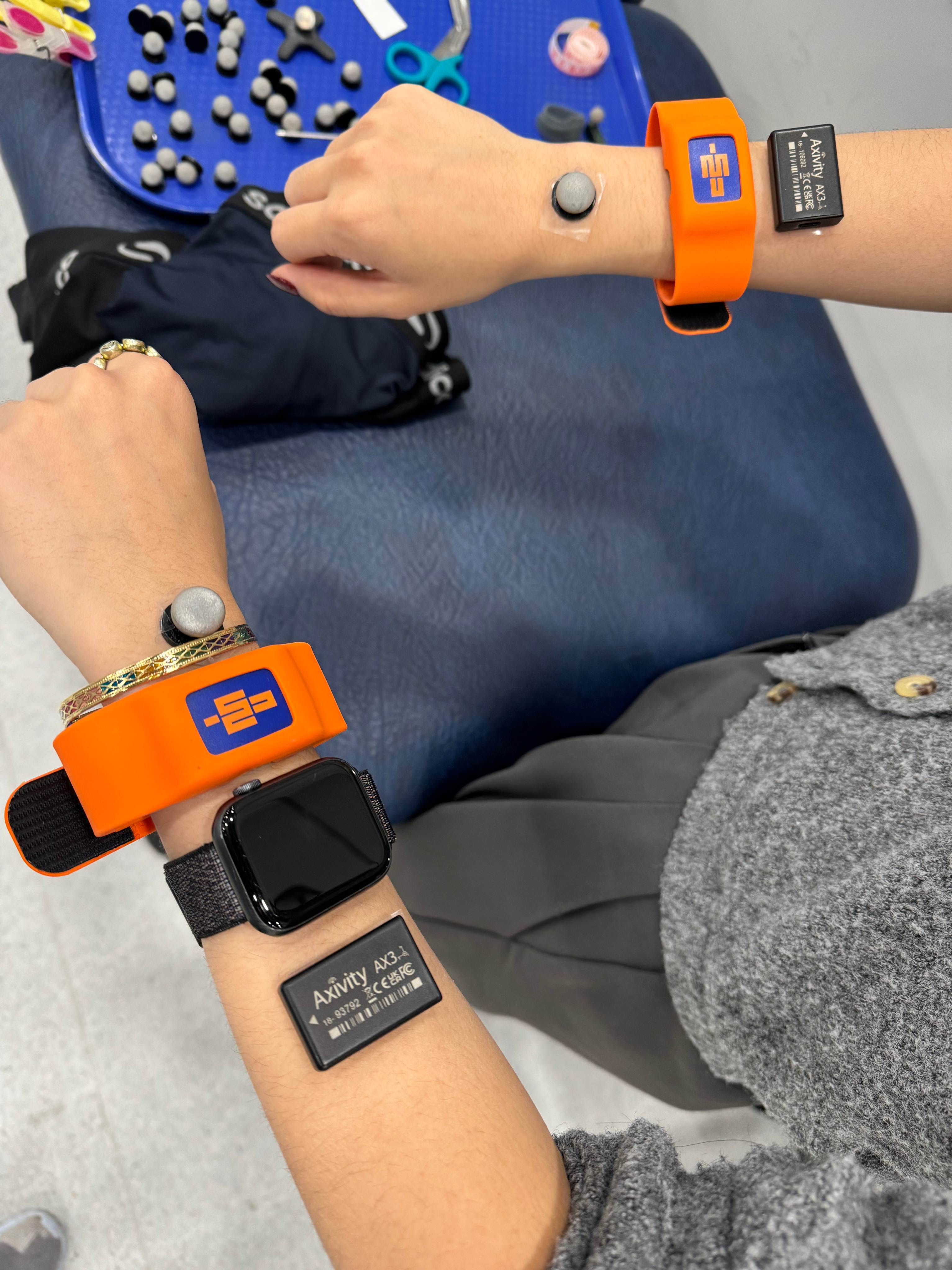 A man with sensors on both arms