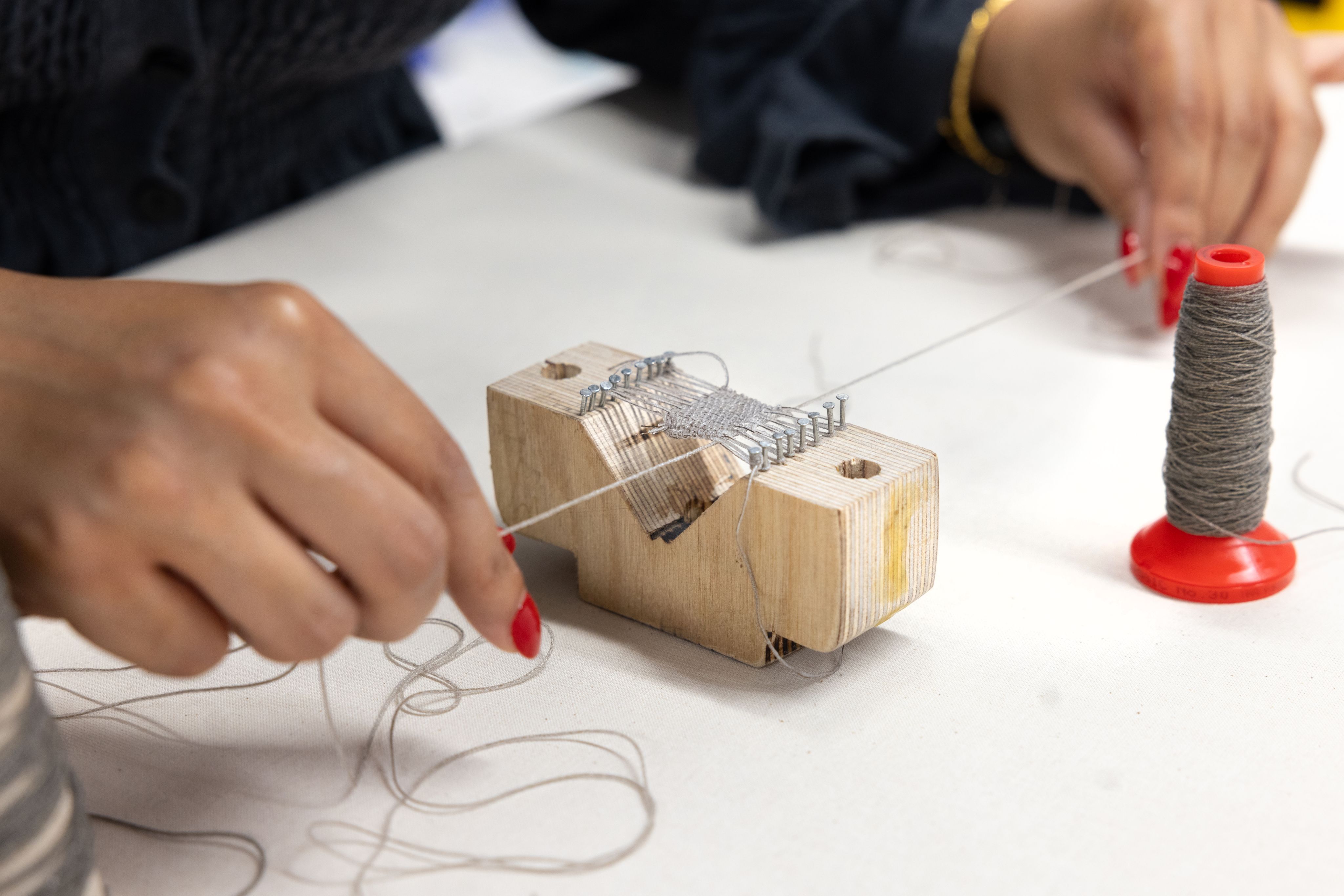 Donors Sanjay and Leslie Patel standing in front of the supersonic wind tunnel 