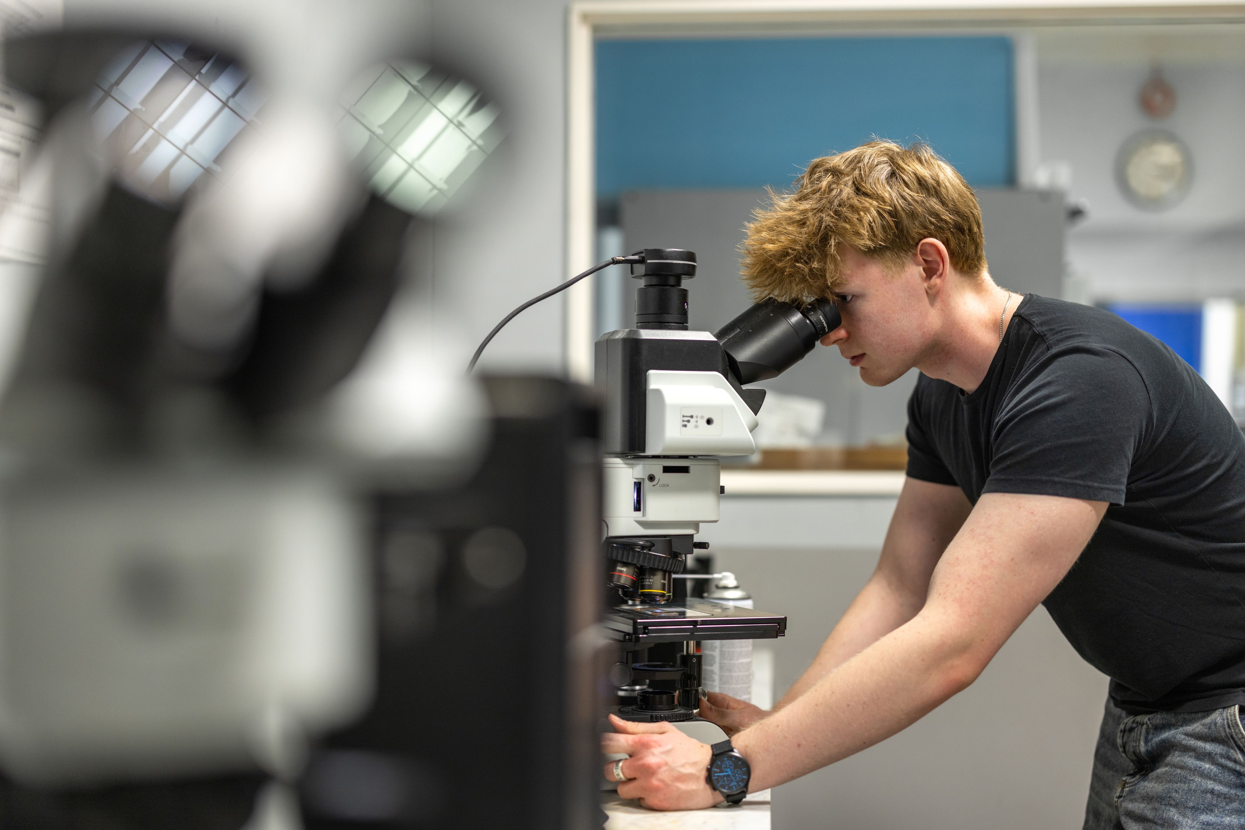 Bursary recipient Sean Miles carries out experiments in the lab as part of his Materials Science and Engineering research
