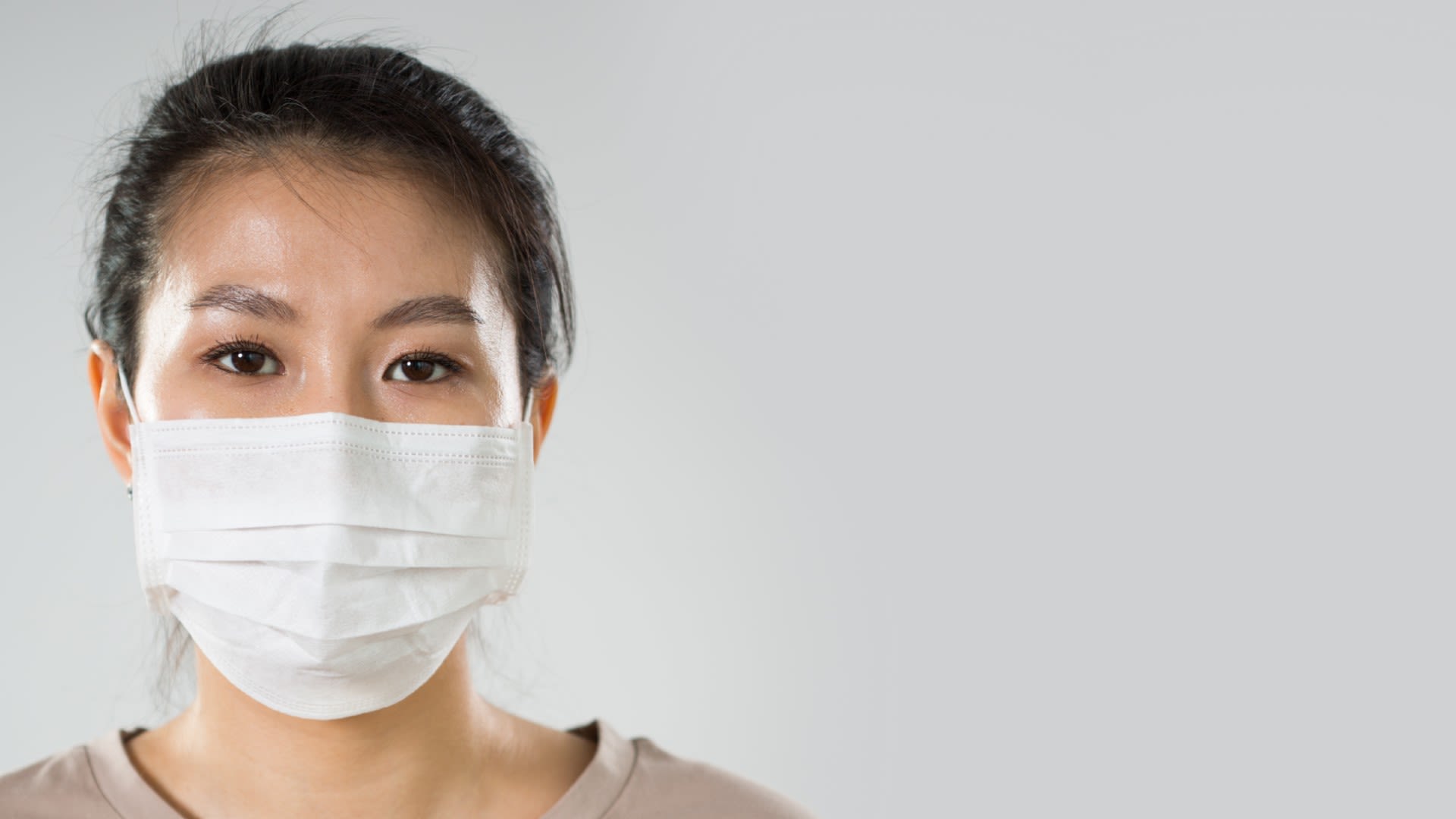 A woman wearing a face mask