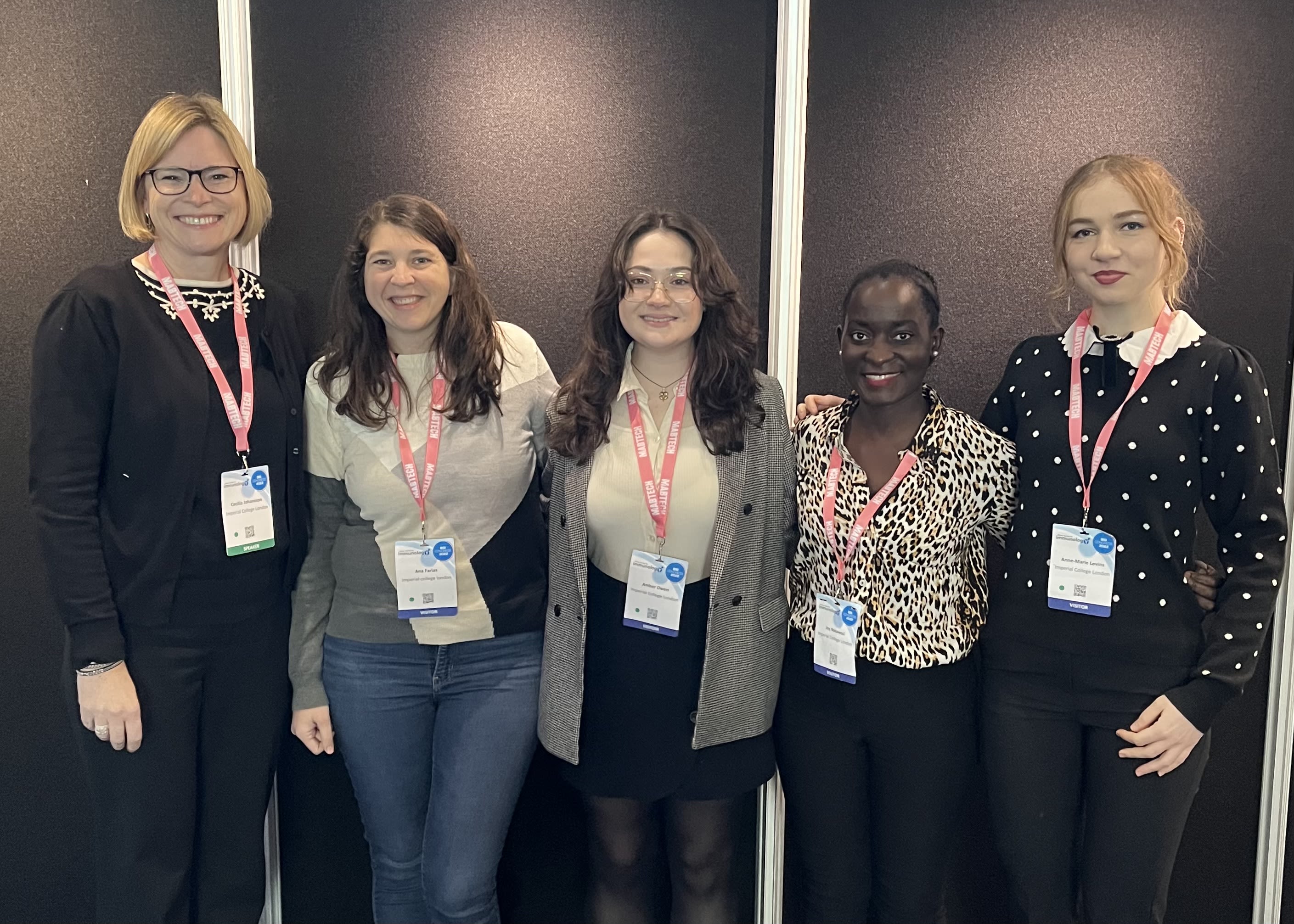 Cecilia with students at conference