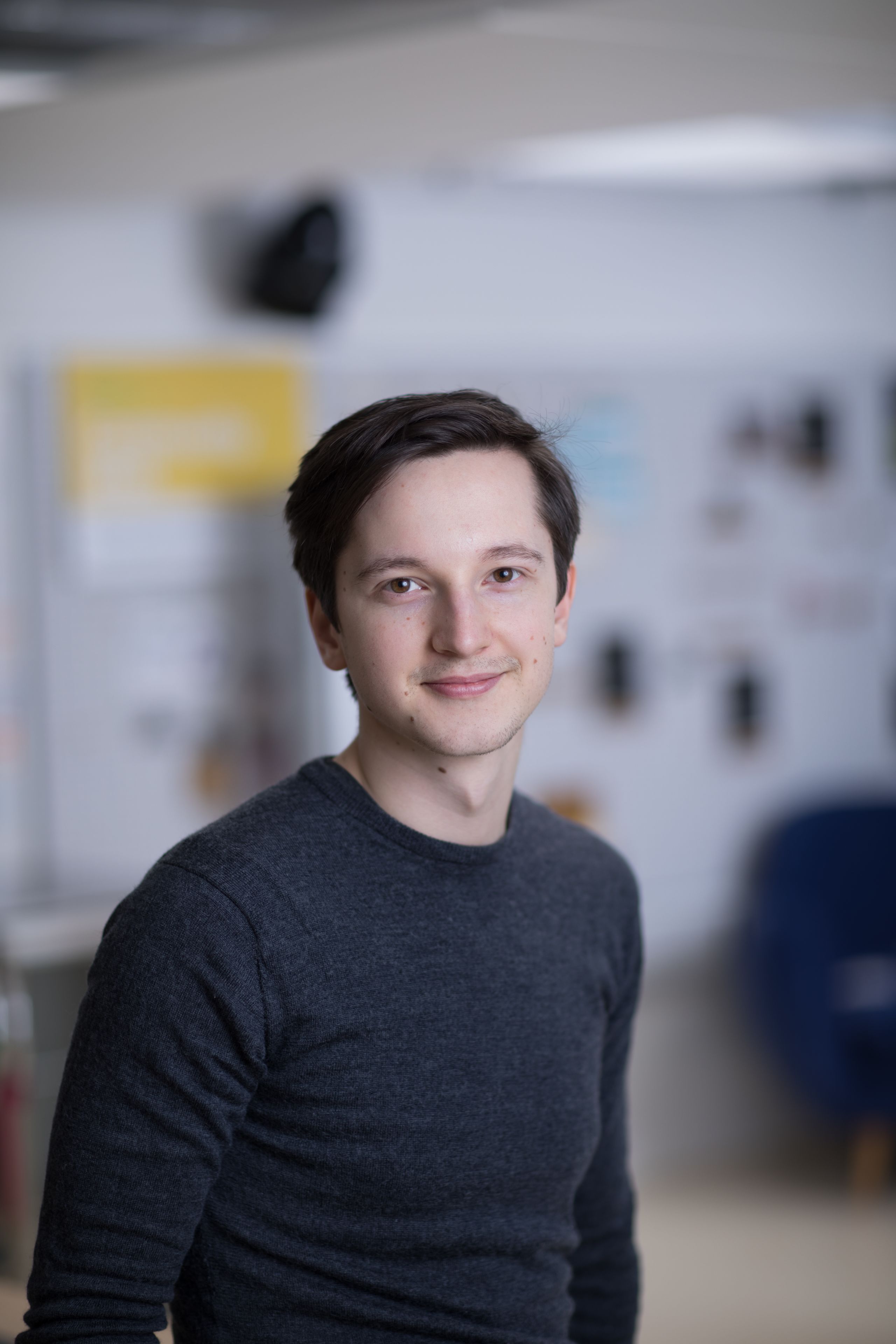 Cai (molecular bioengineering) smiling at the camera.