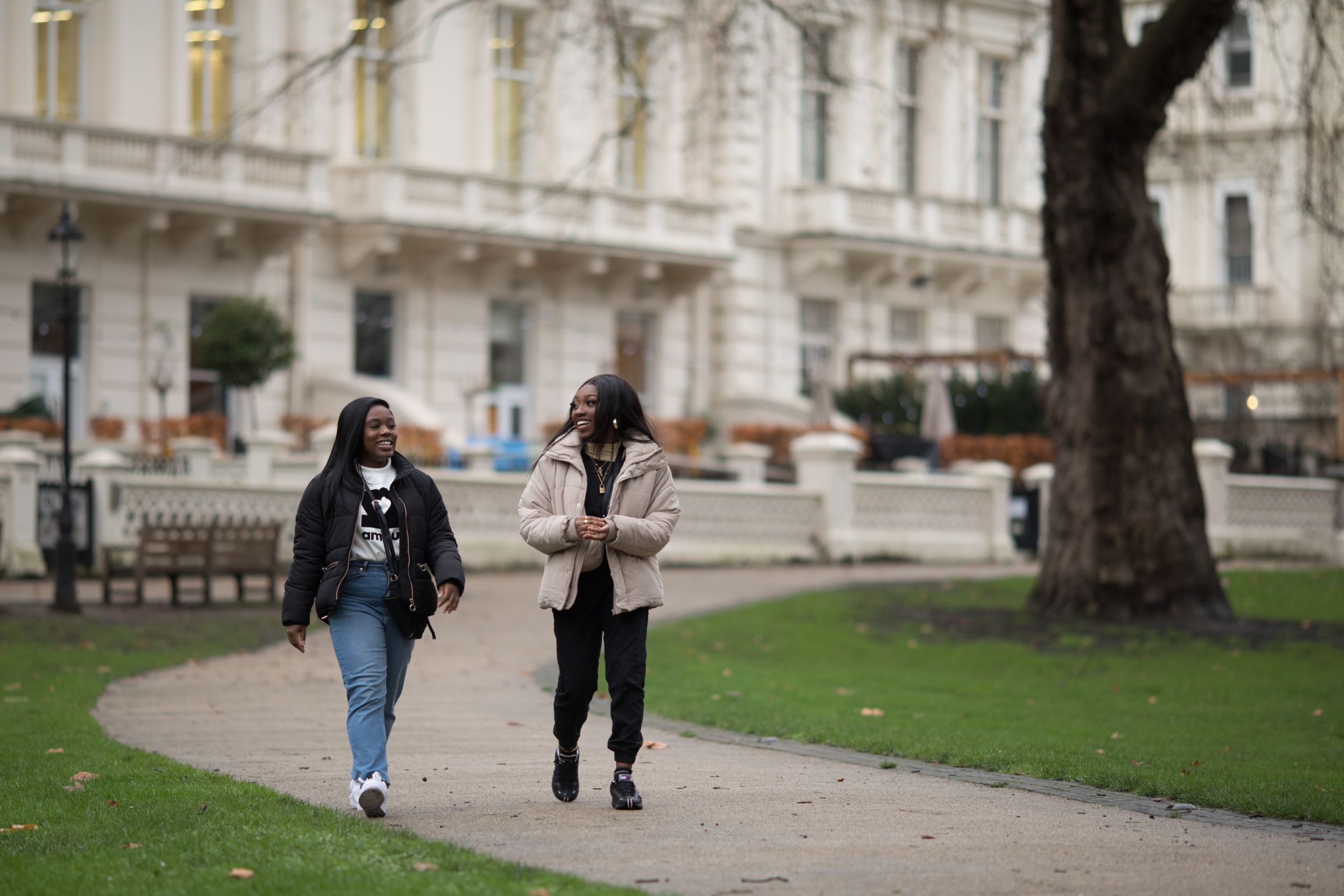Jessica (design engineering) and Agogo walking through Prince's Gardens on our South Kensington Campus.