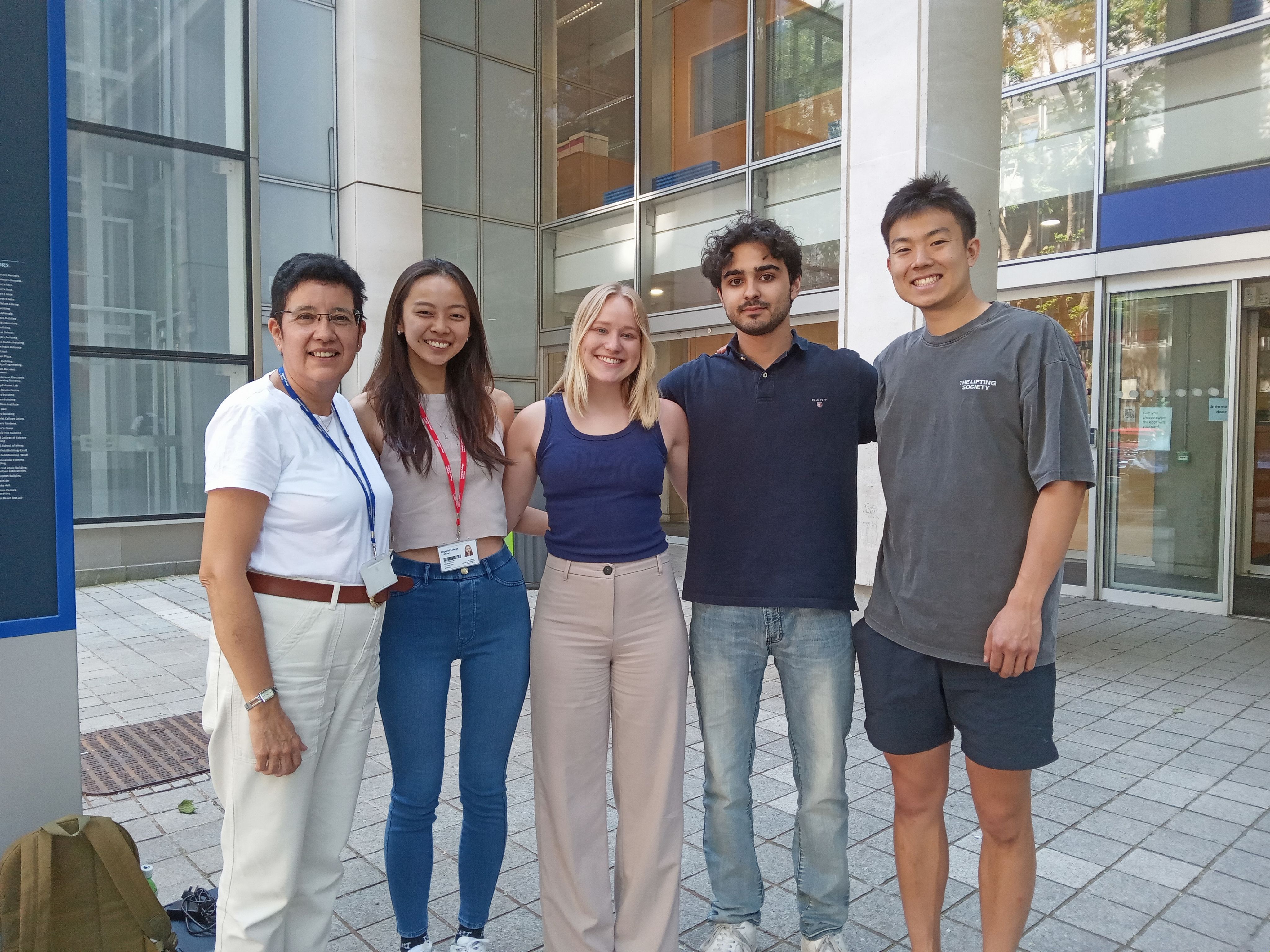 Andrew with his team standing outside the Sir Alexander Fleming Building on South Kensington Campus
