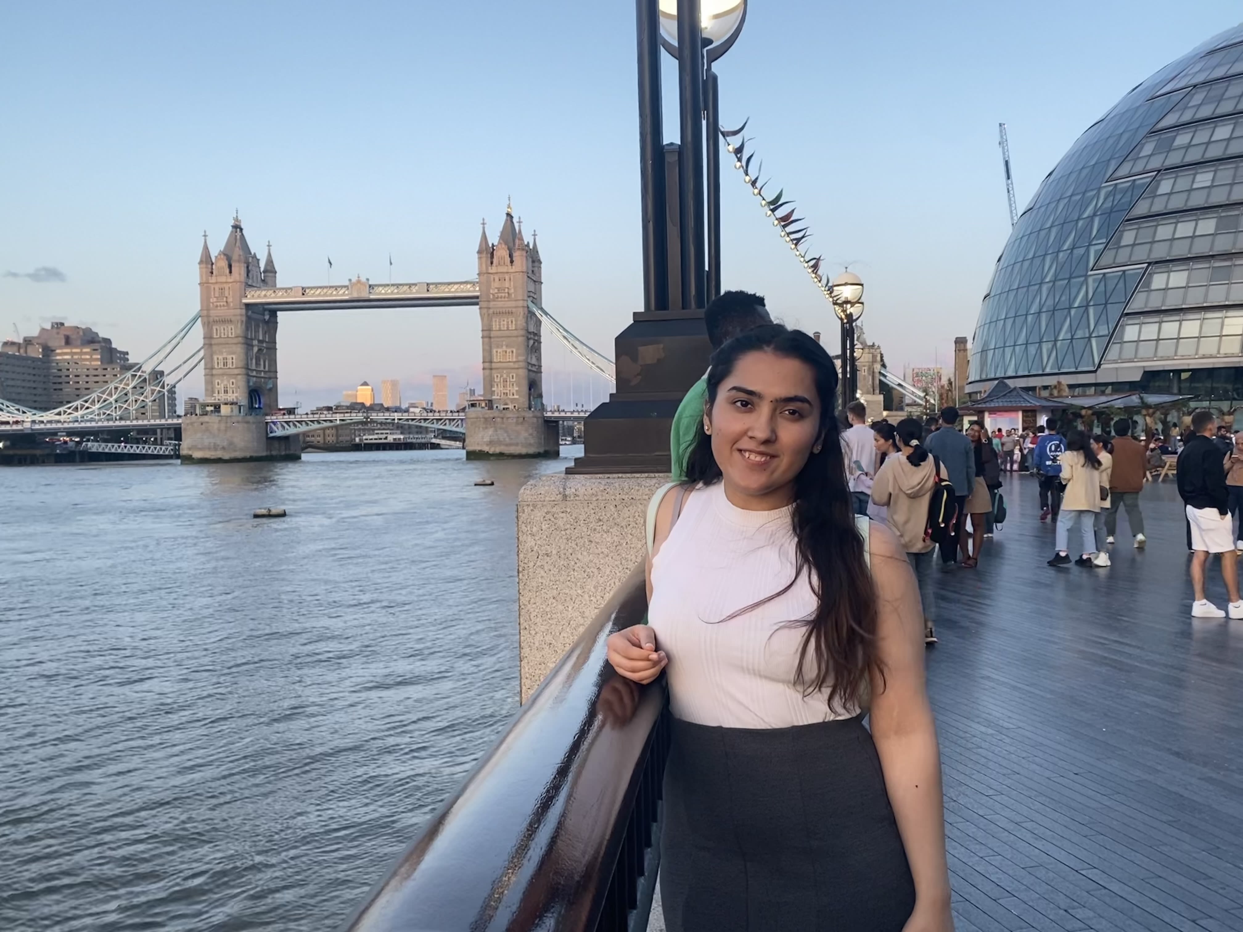 Ashima standing in front of Tower Bridge
