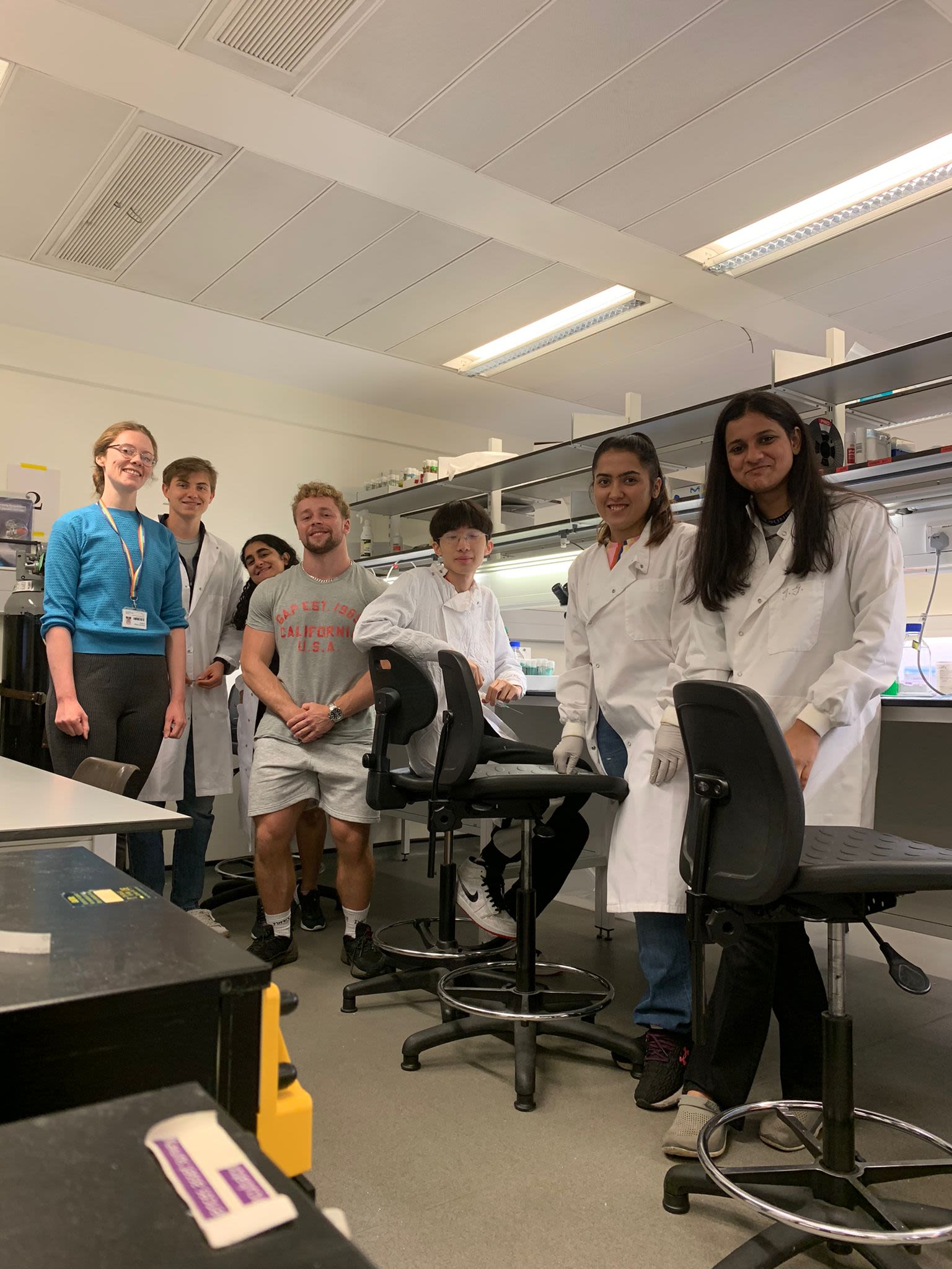 Ashima and coursemates in a lab