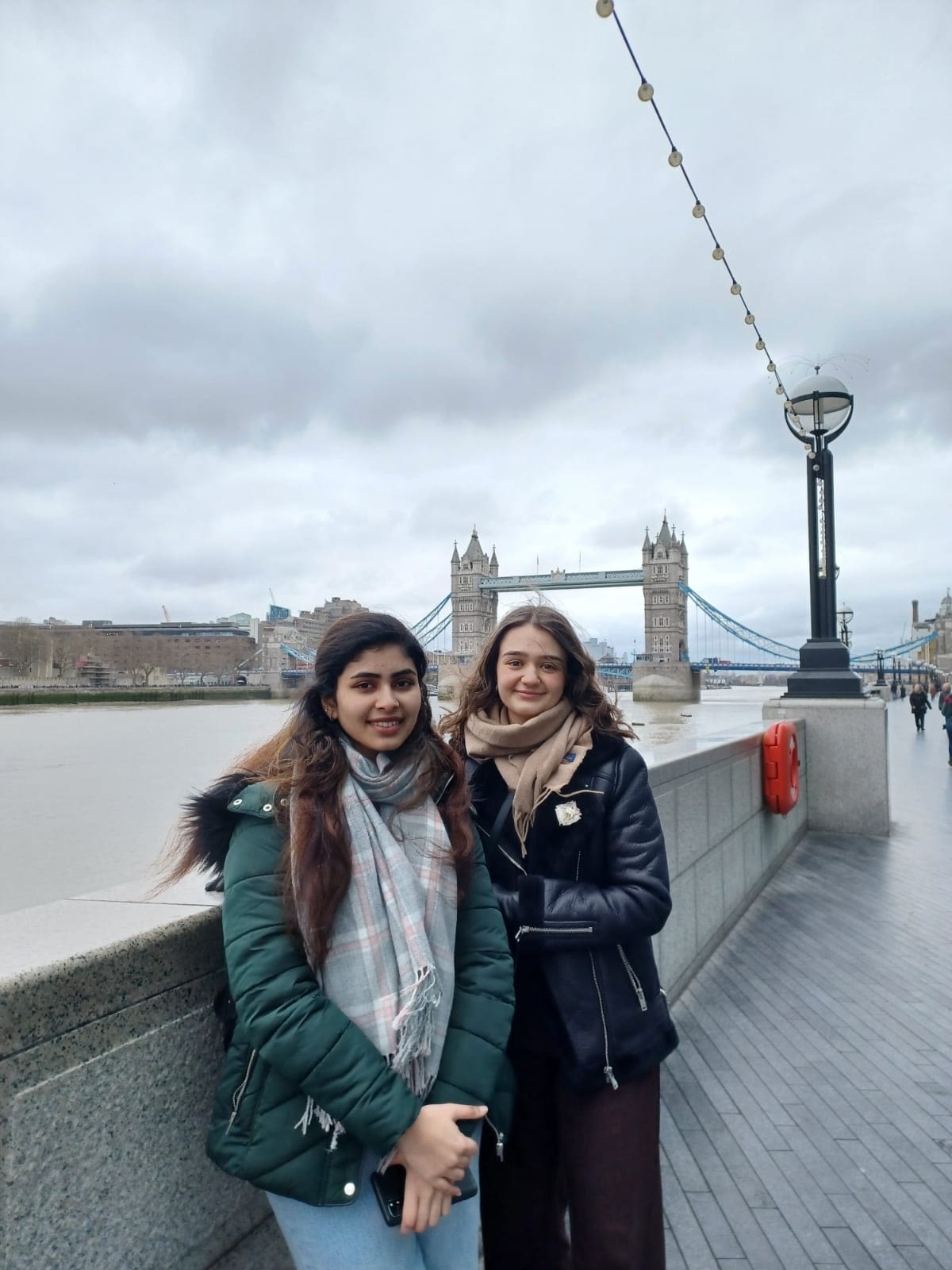 Cristiana with a friend. Tower Bridge is in the background