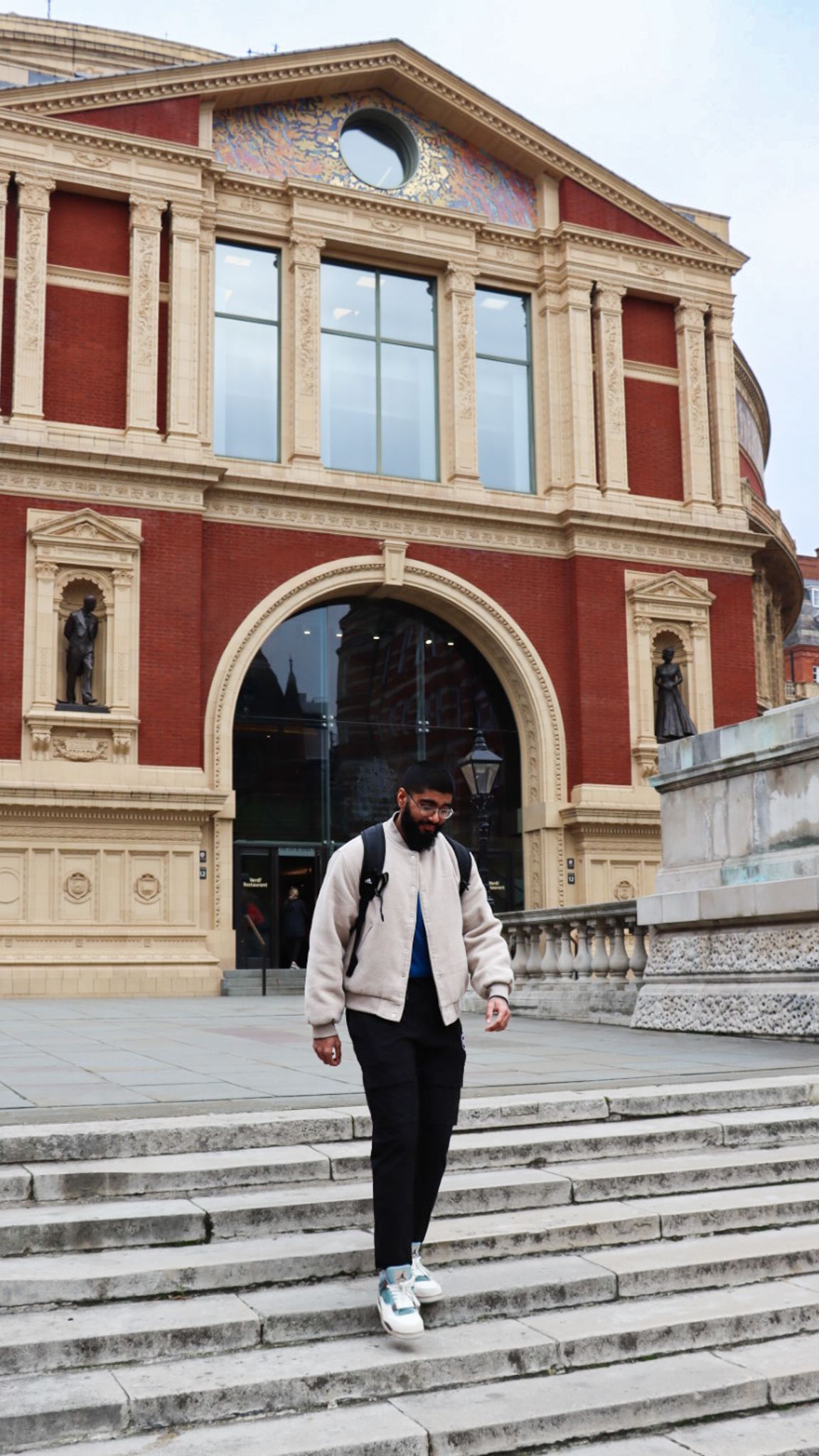 Haaris walking down the staircase outside Royal Albert Hall