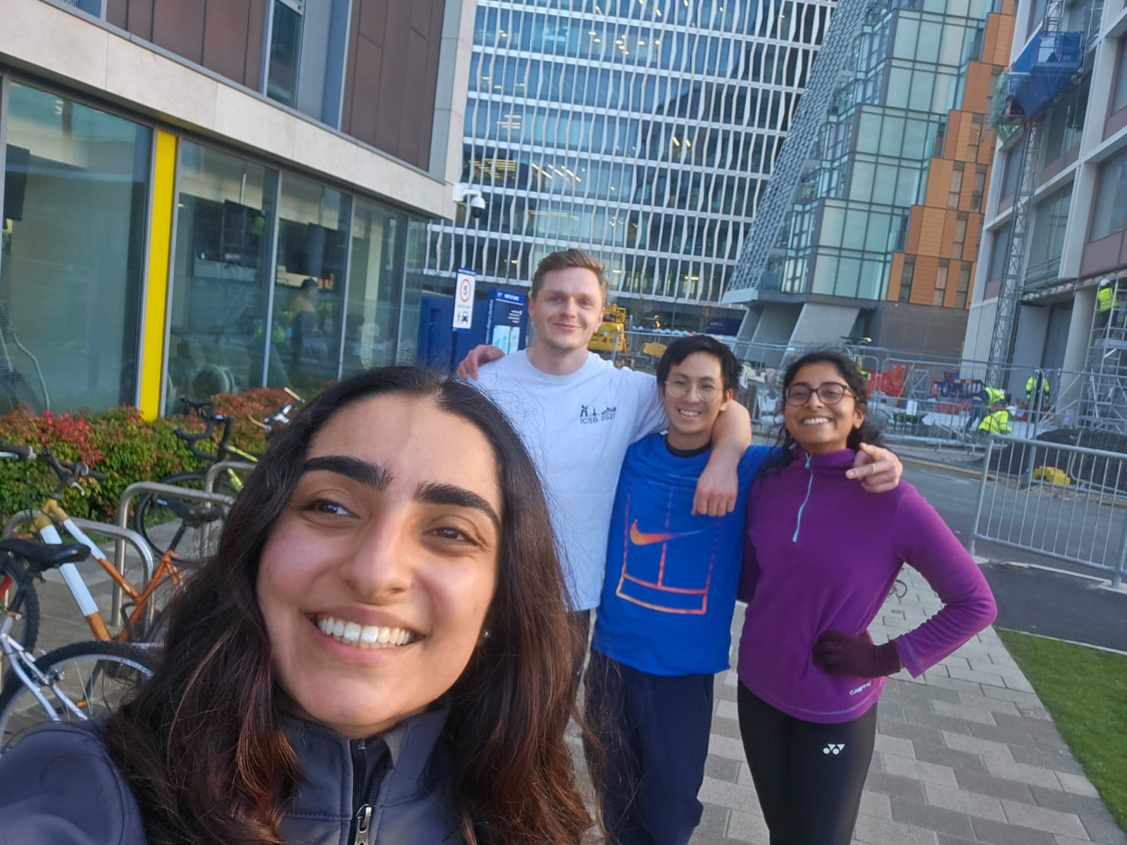 JJ in sportswear with a group of friends