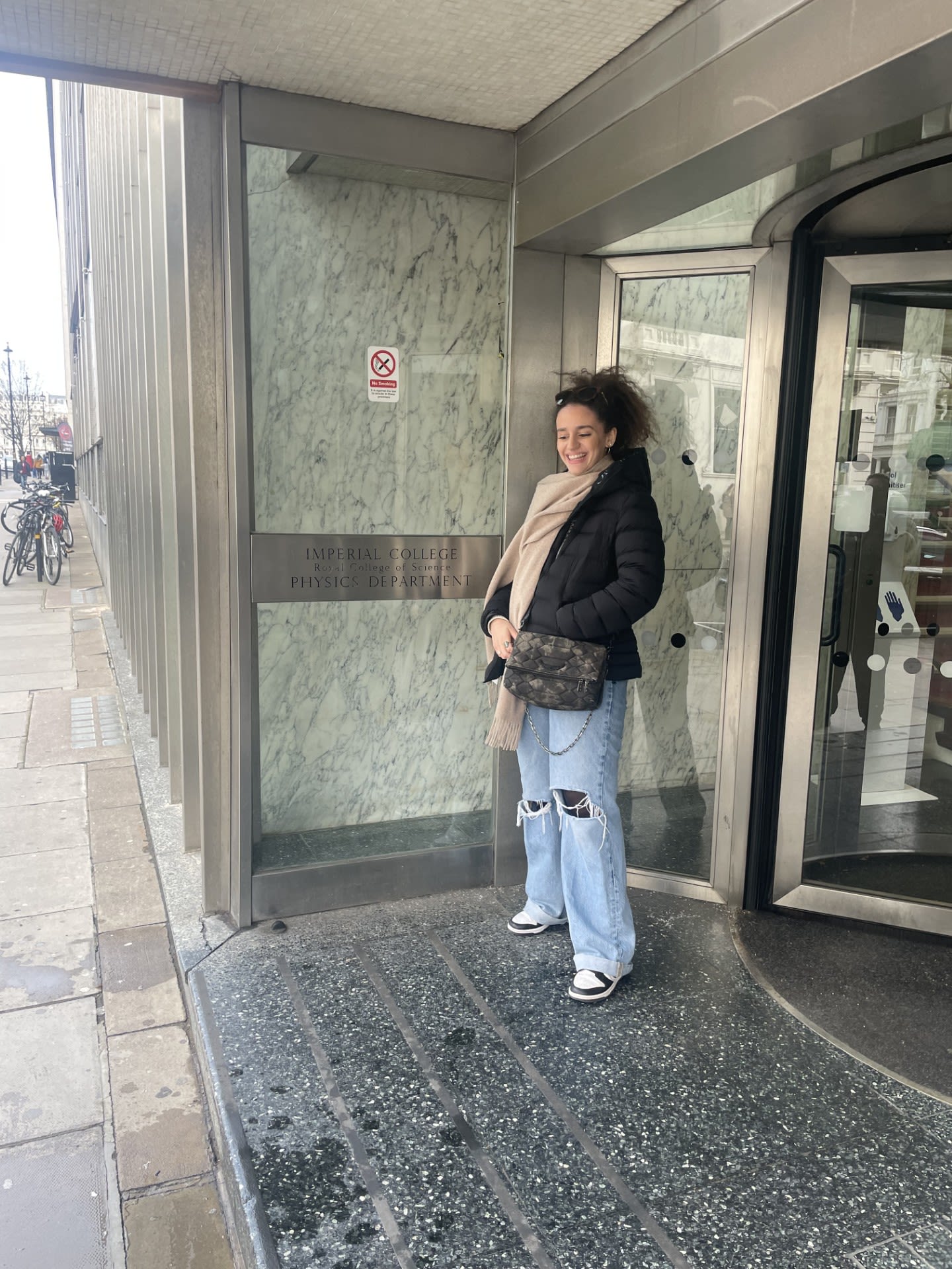 Katerina standing outside Imperial's campus