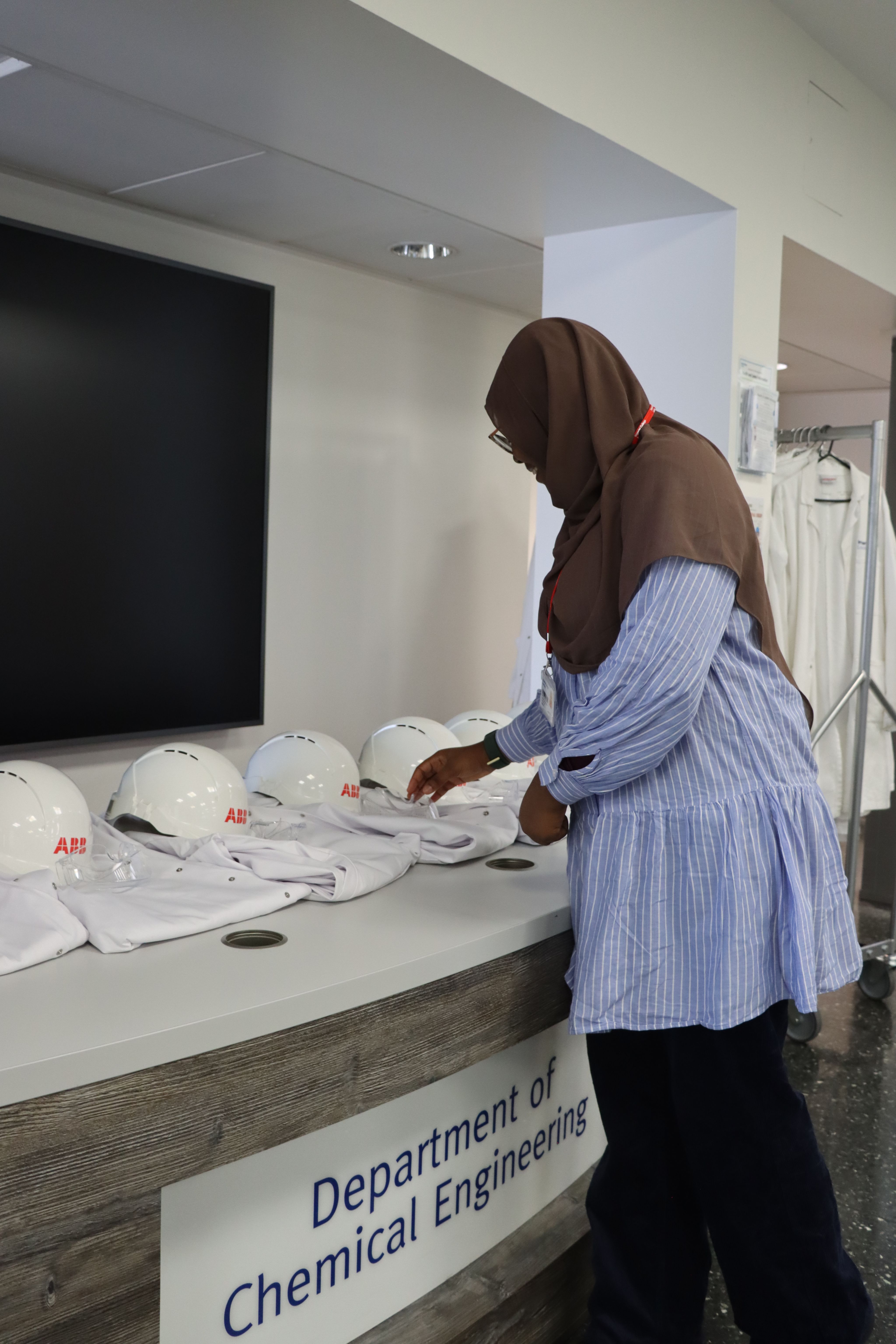 Maryam picking up PPE