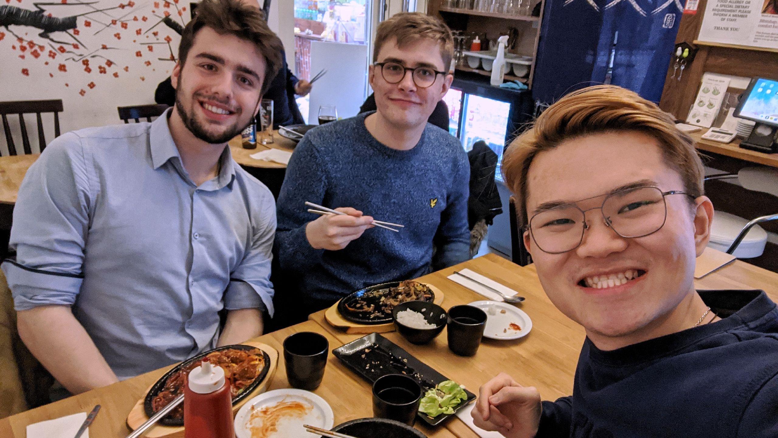 Max and friends eating in a restaurant.