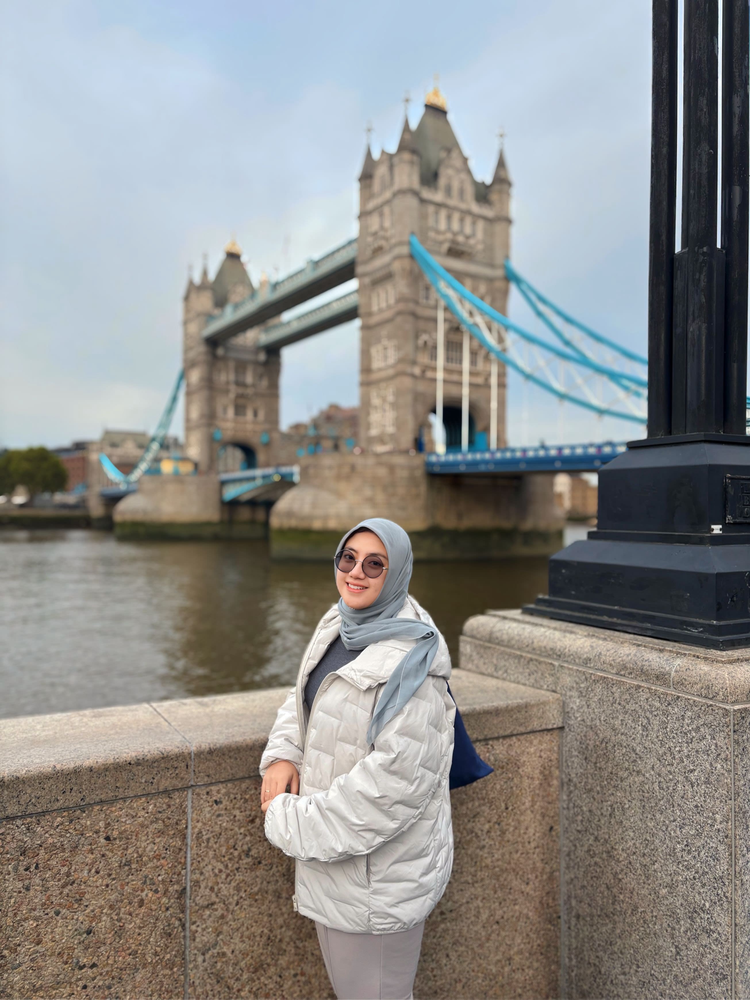 Nava standing in front of Tower Bridge in London